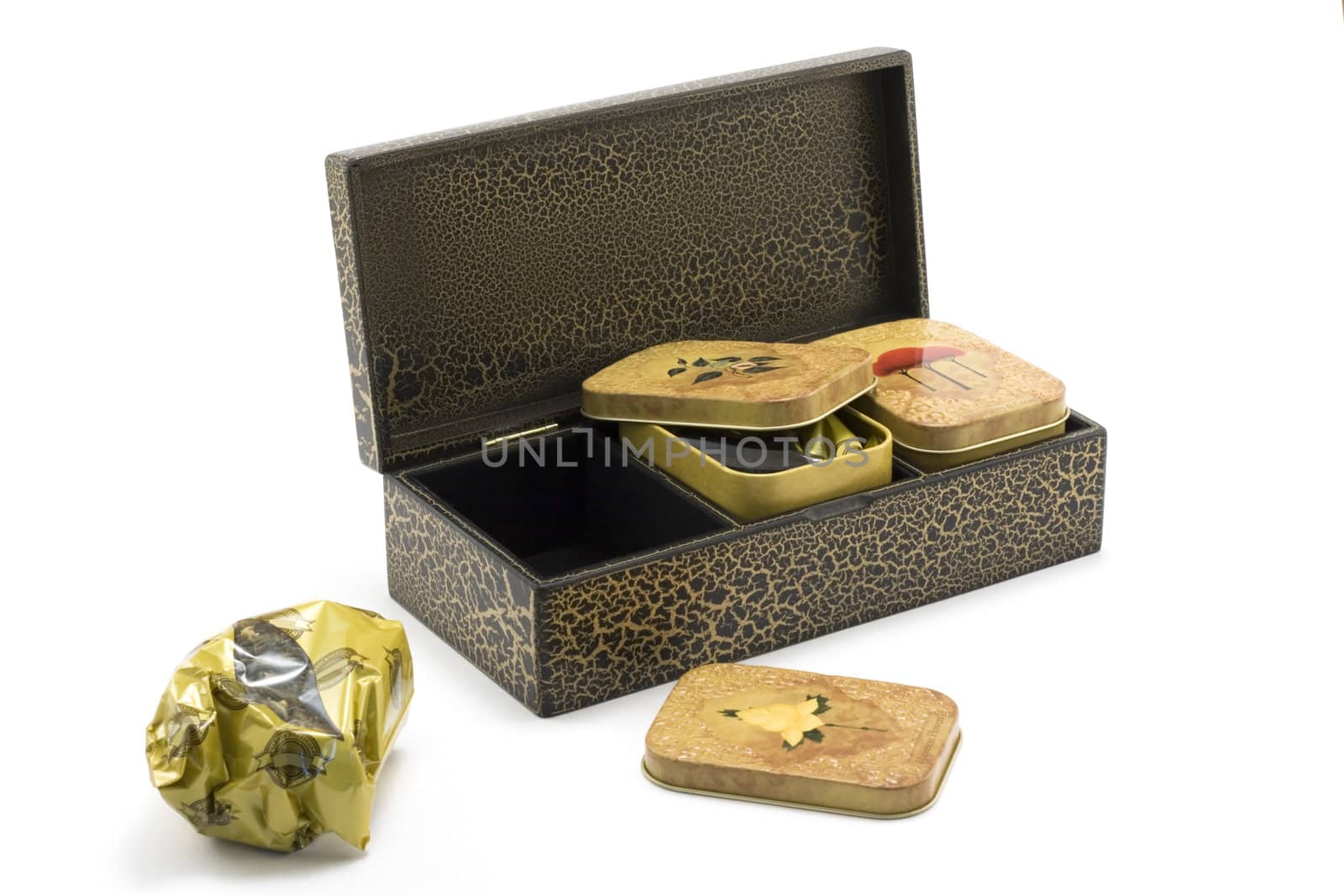 Wooden box with tea insulated not white background