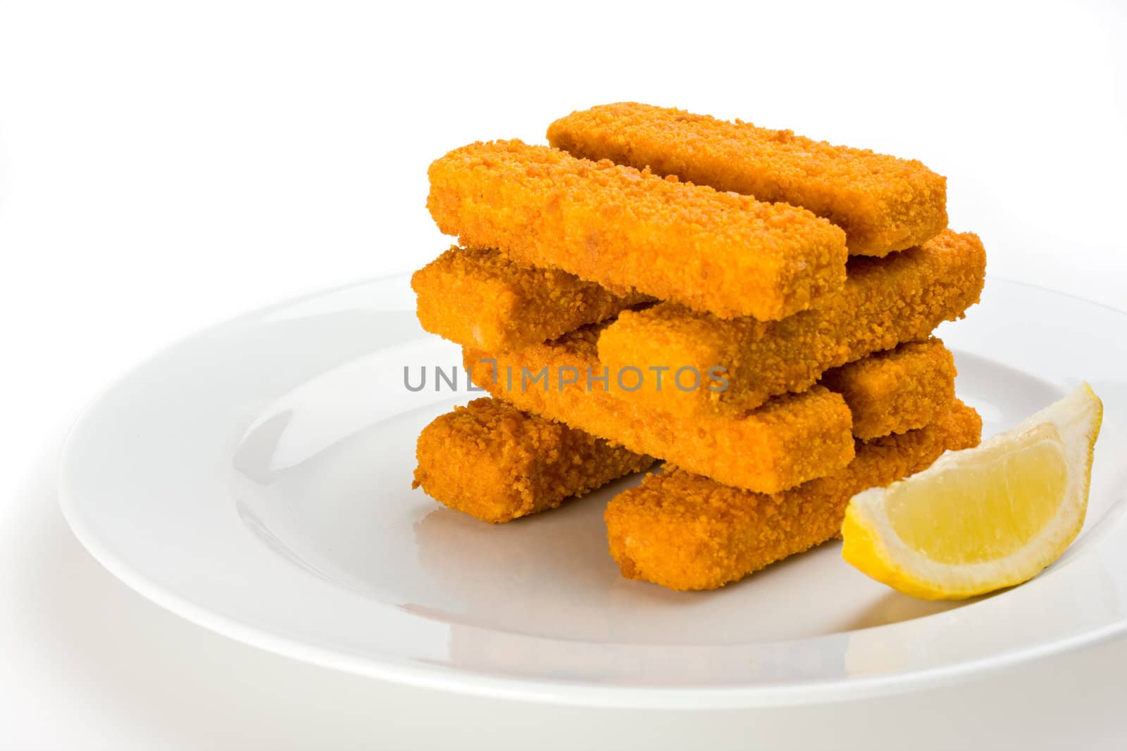 eight fish fingers on a white plate