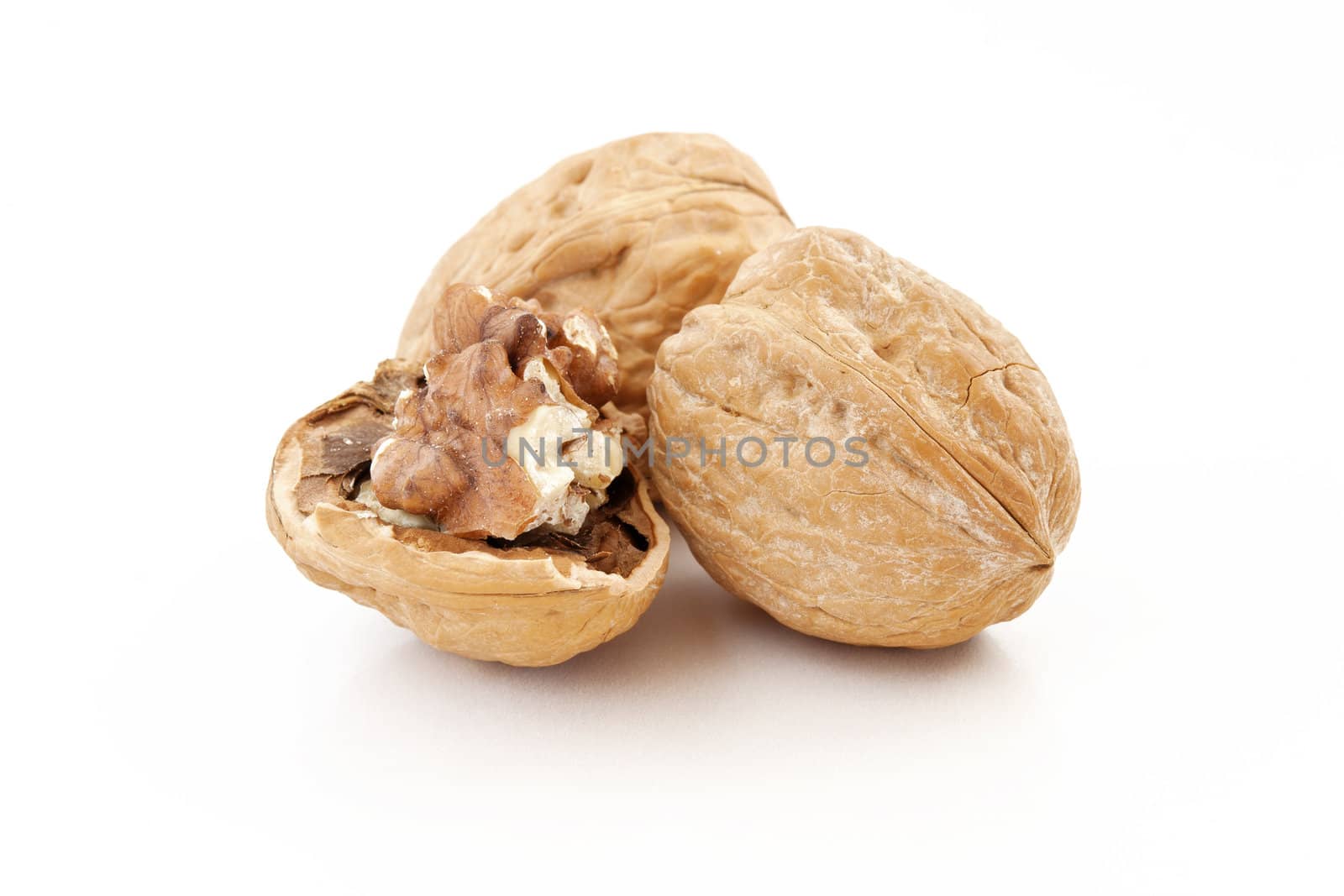 three walnuts isolated on white background