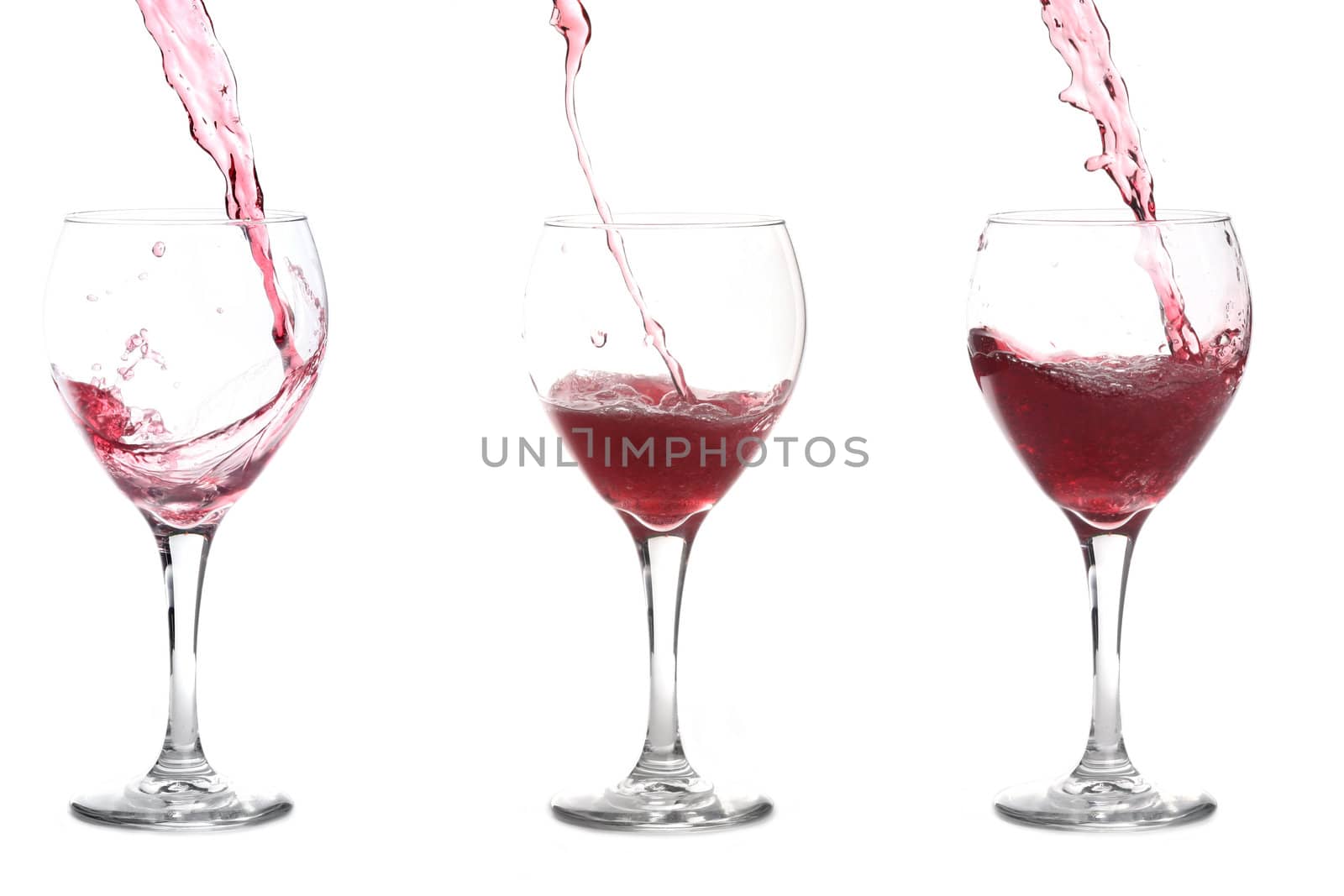 Red Wine Pouring into Glasses by tobkatrina