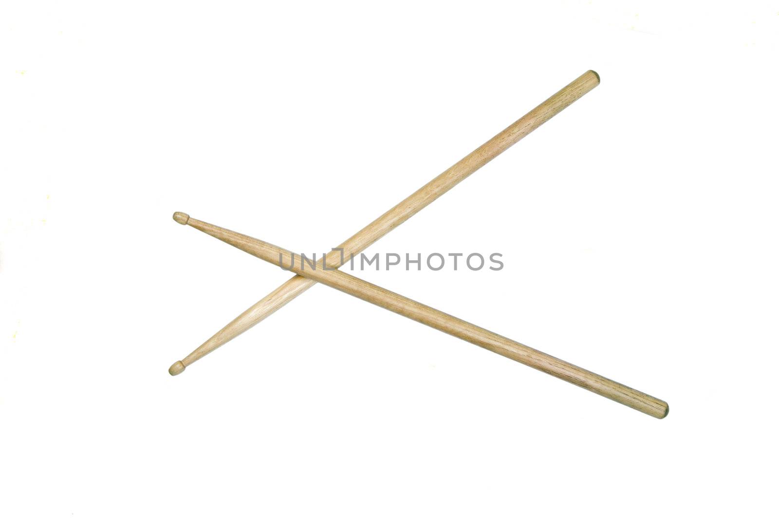 Two drumsticks crossed and isolated over white with clipping path