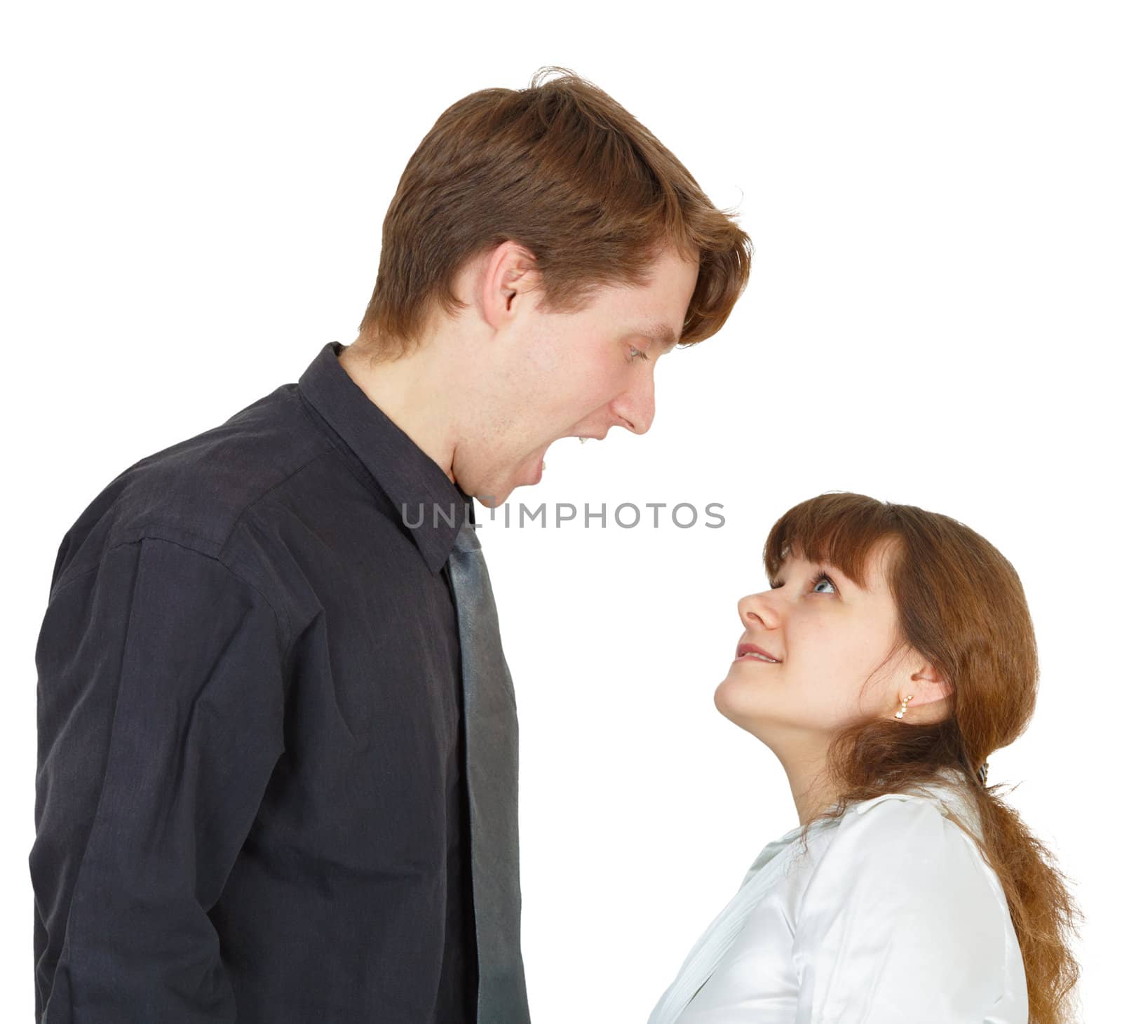 The man angrily shouted at the young woman