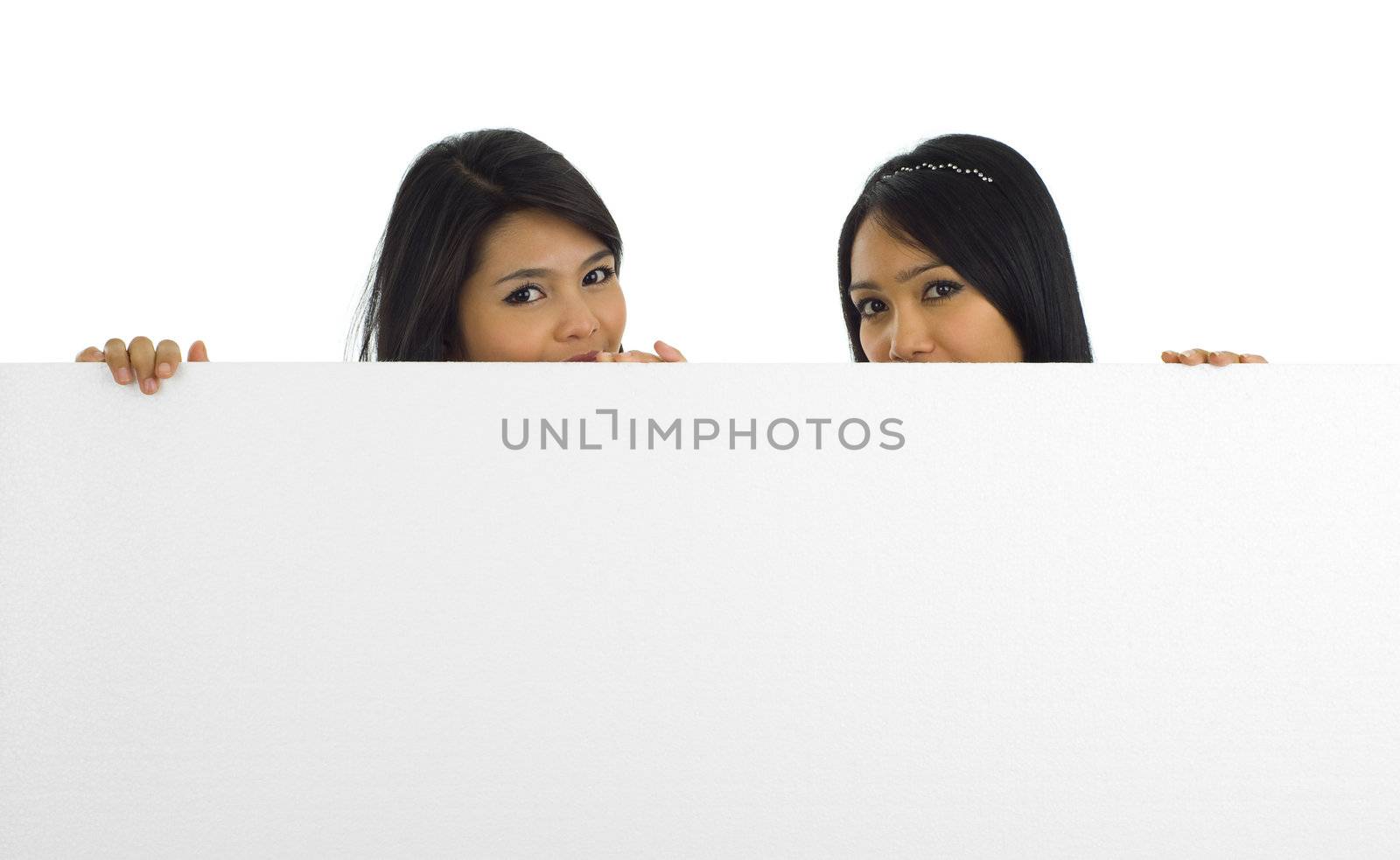 two beautiful asian women with a white board, isolated on white