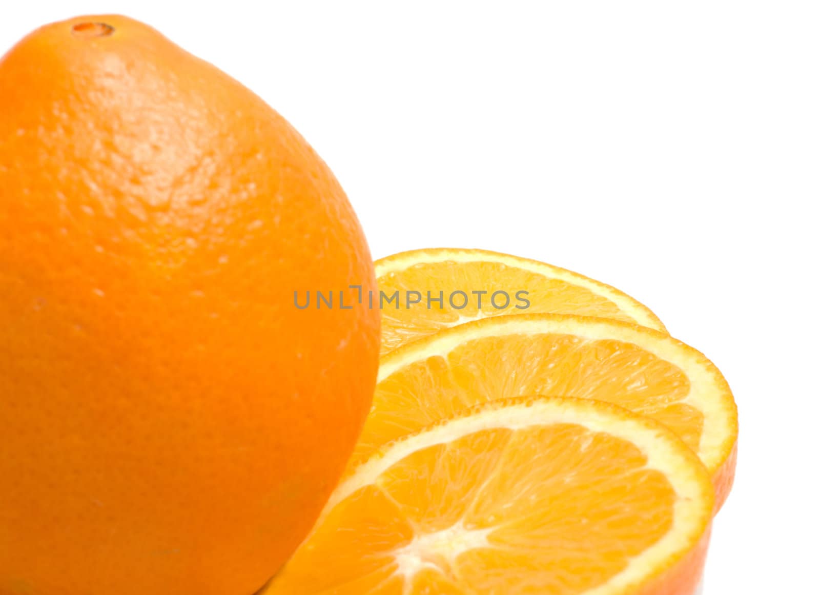 Close up of oranges on a white background.