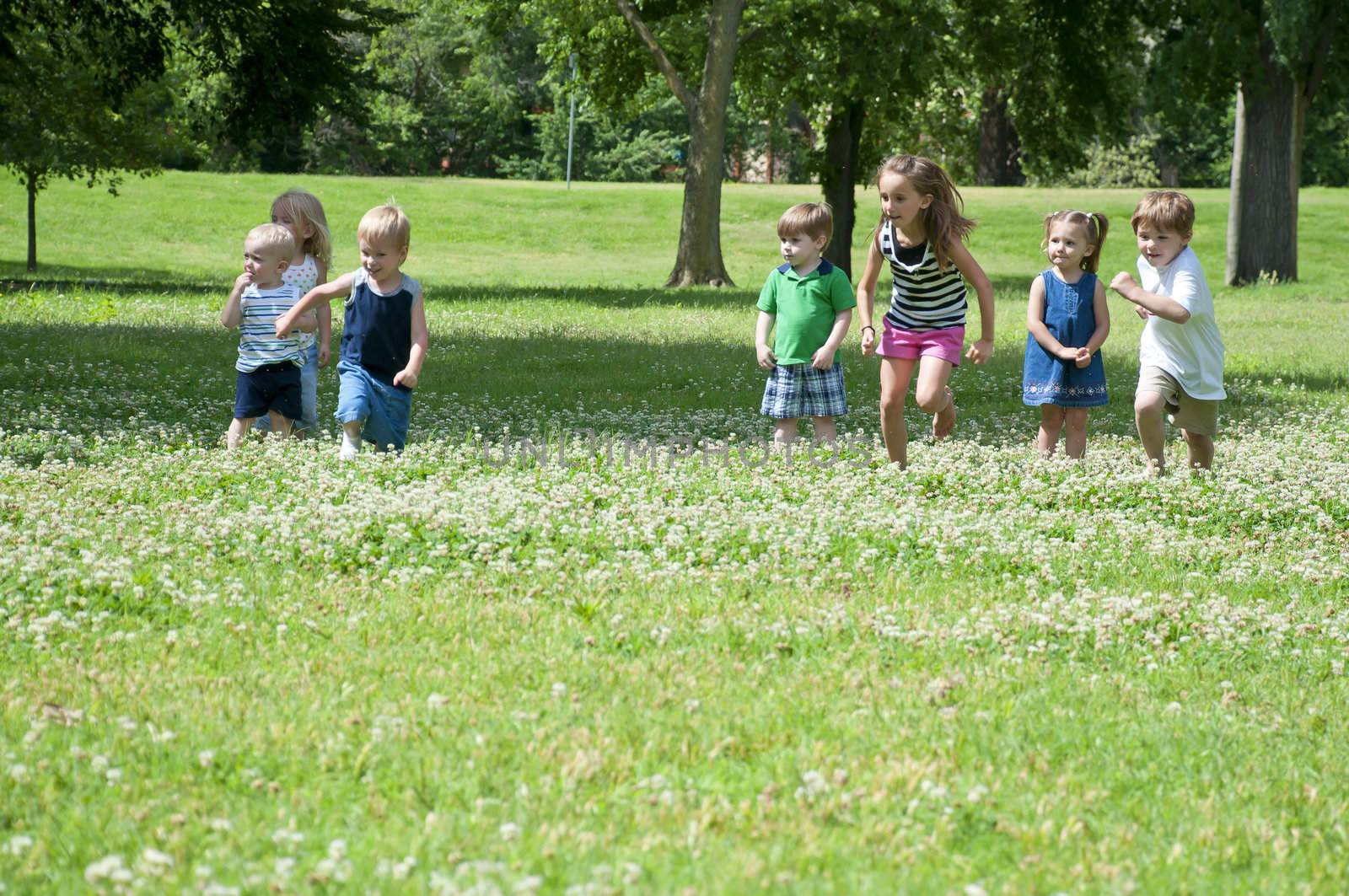 sunny day in the park with children playing