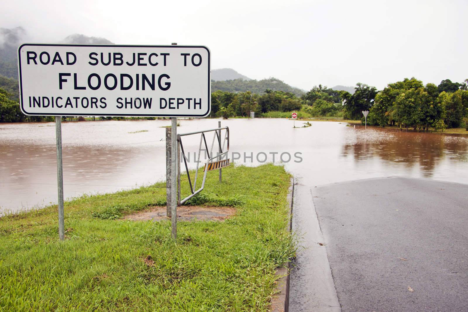 Flooded road after heavy rain by Jaykayl