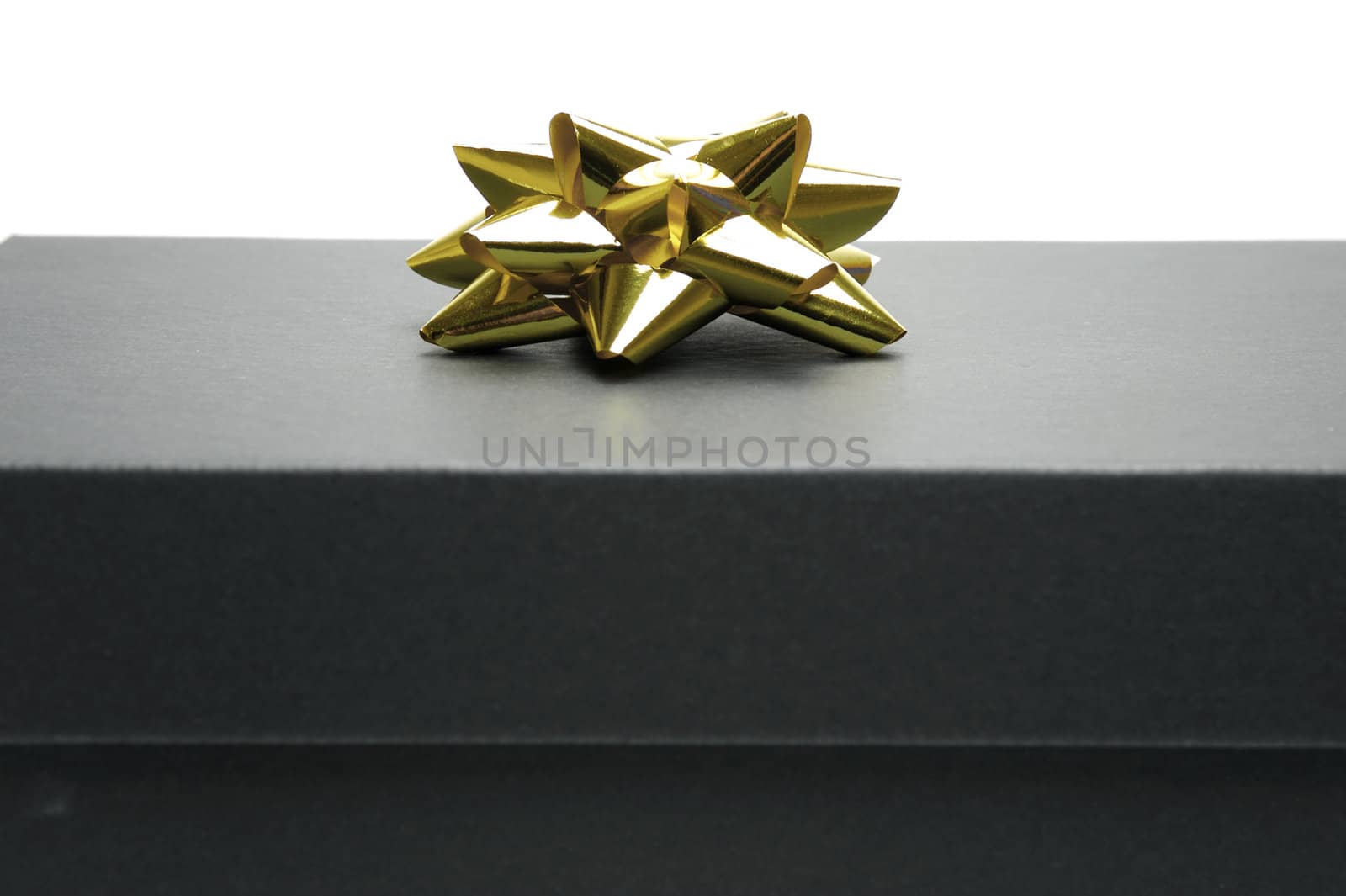 Black gift box isolated against a white background