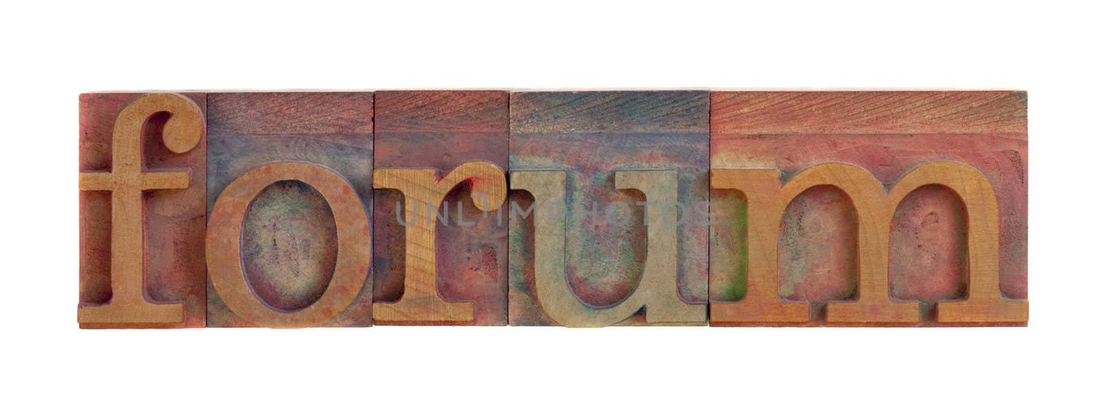 the forum word  in vintage wooden letterpress type blocks, stained by color ink, isolated on white