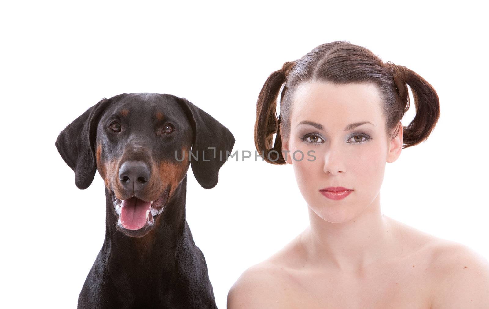 Beautiful woman with a doberman pincher to her side