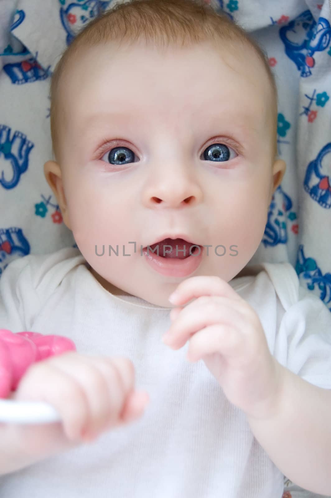 Cute baby with surprised face