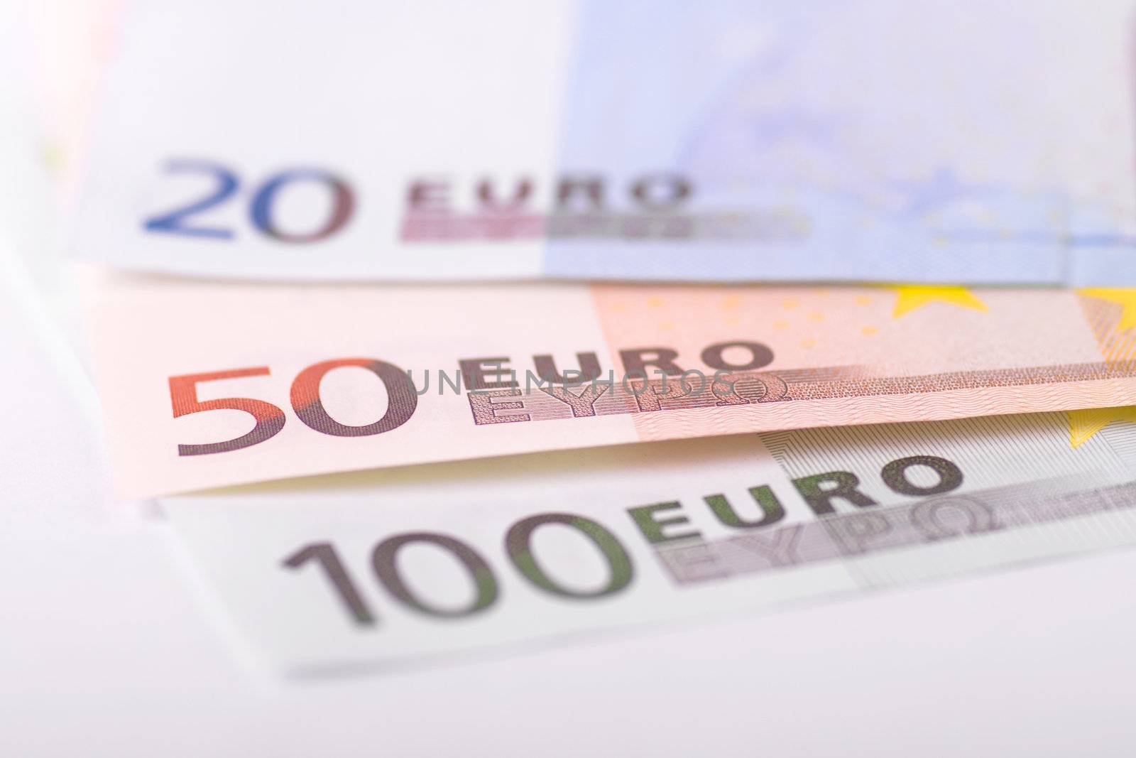 Various euro banknotes with selective focus on 50