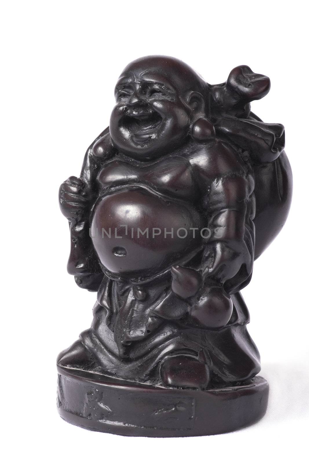 Traditional wooden Chinese god statuette isolated on white