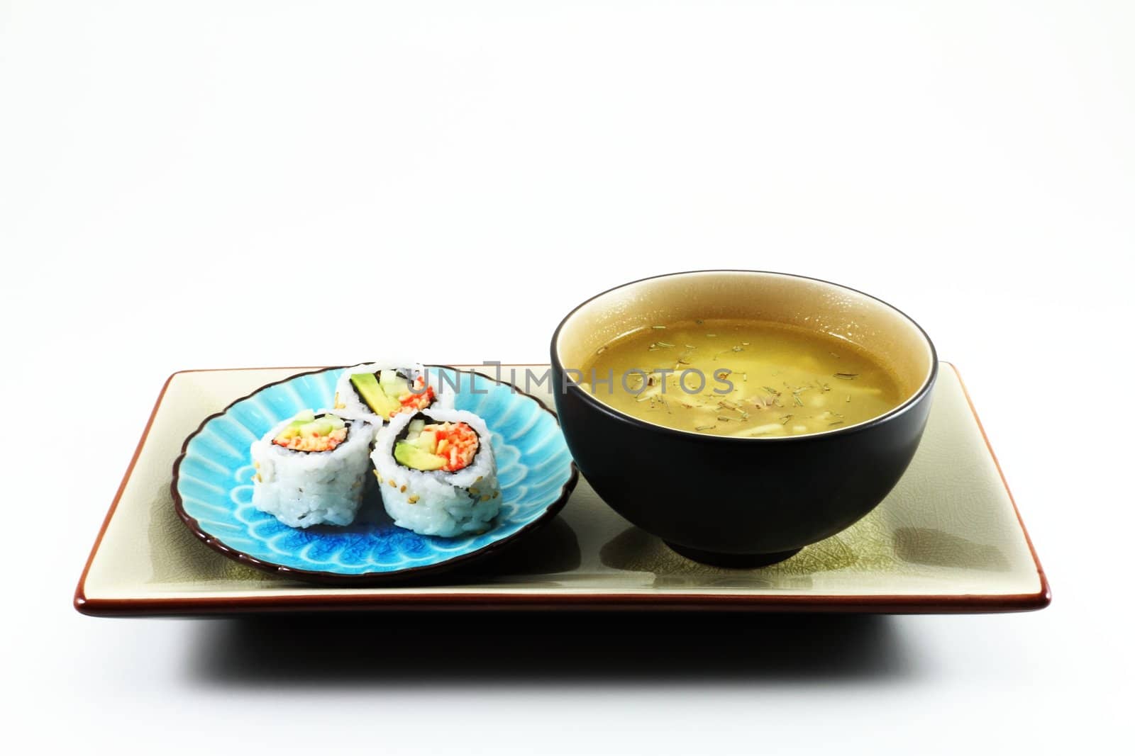 Fresh sushi served with a bowl of soup.