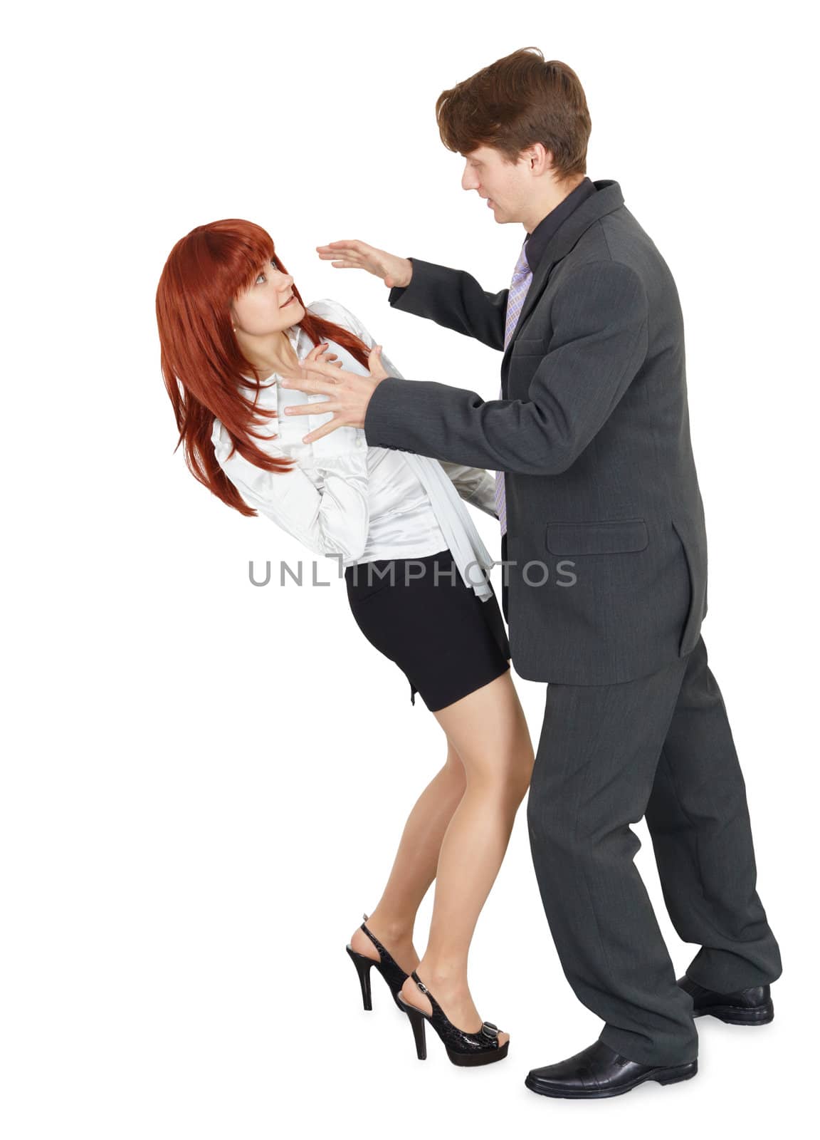 A young man attacks a woman, isolated on a white background