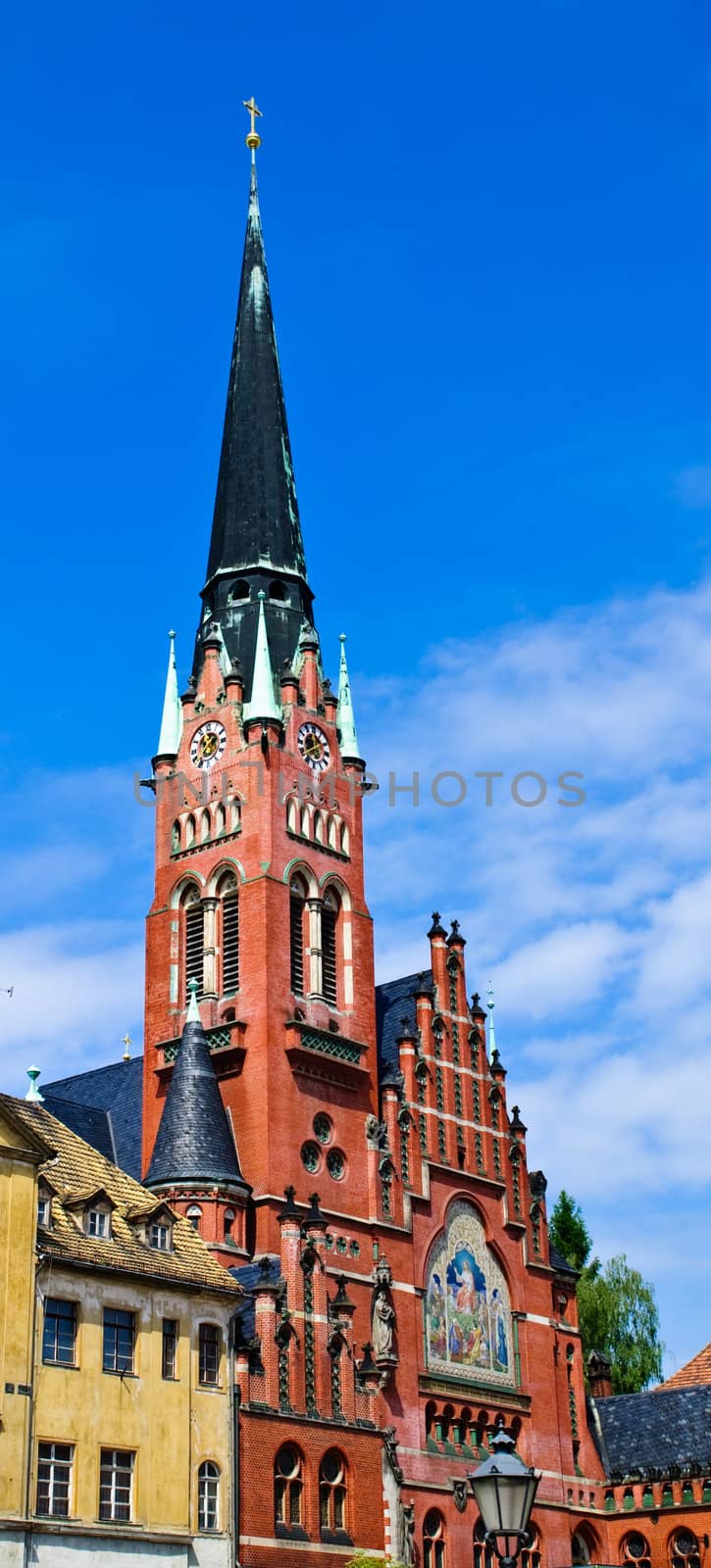 Brotherly church in the centre of an old city against the blue sky in the summer