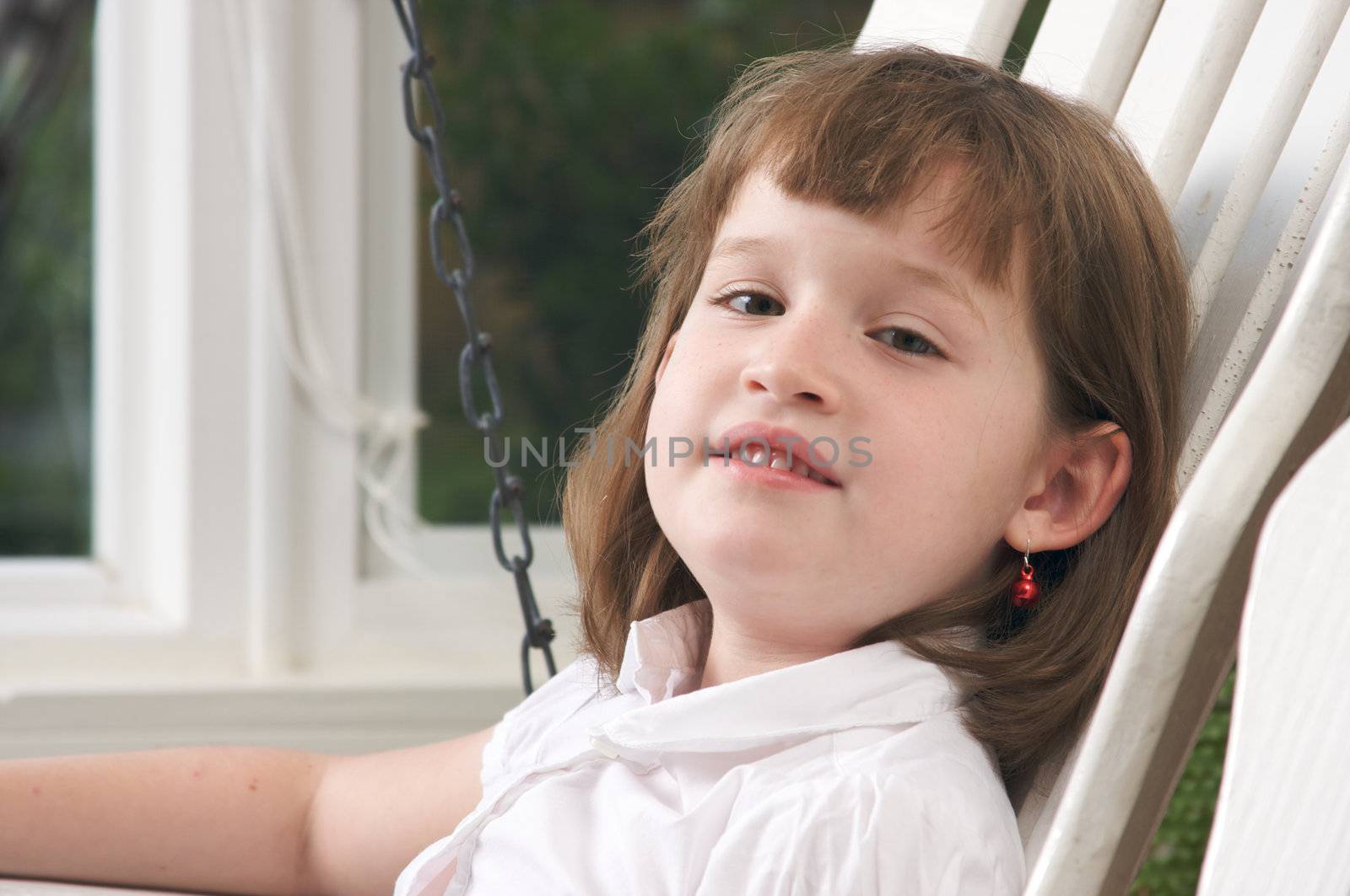 Adorable Girl Poses for a Fun Portrait