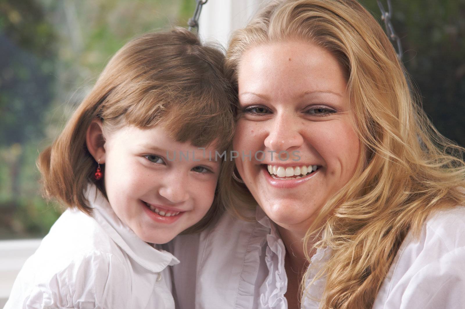 Young Mother and Daughter Enjoying a Personal Moment