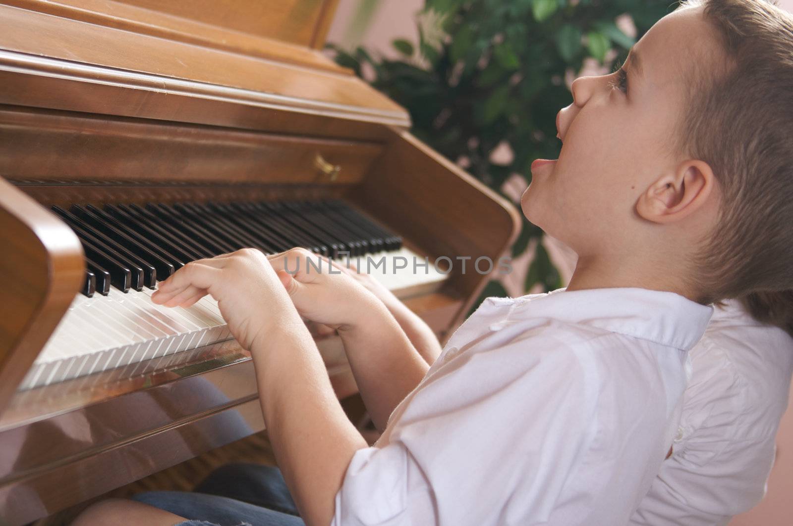 Children Playing the Piano by Feverpitched