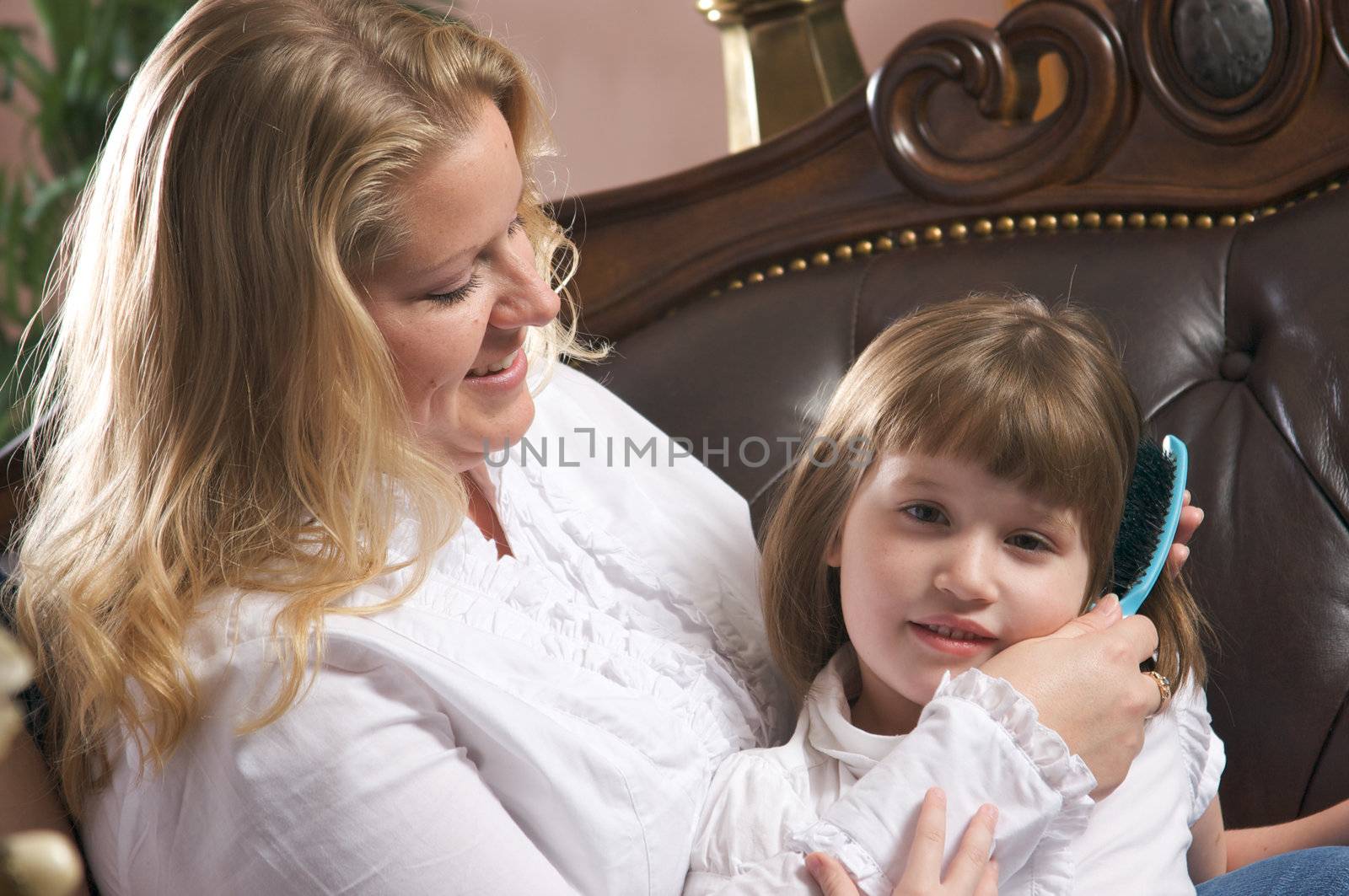 Young Mother and Daughter Enjoying a Personal Moment