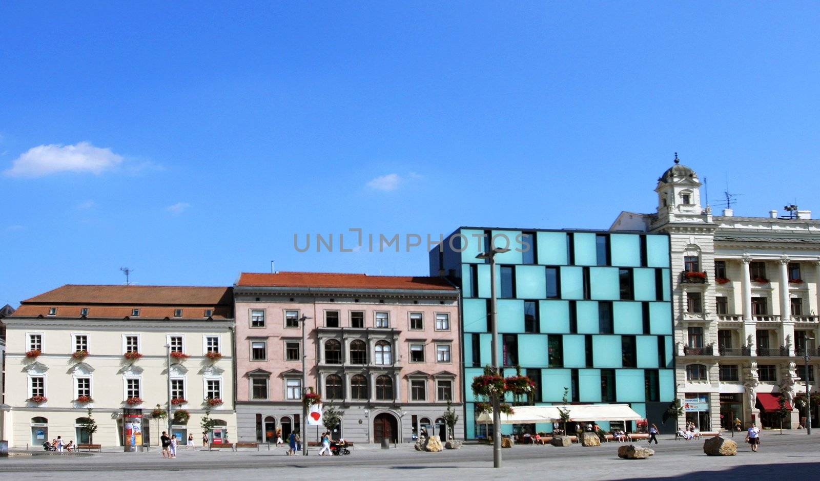 Freedom square in day light with modern and historical buildings by haak78