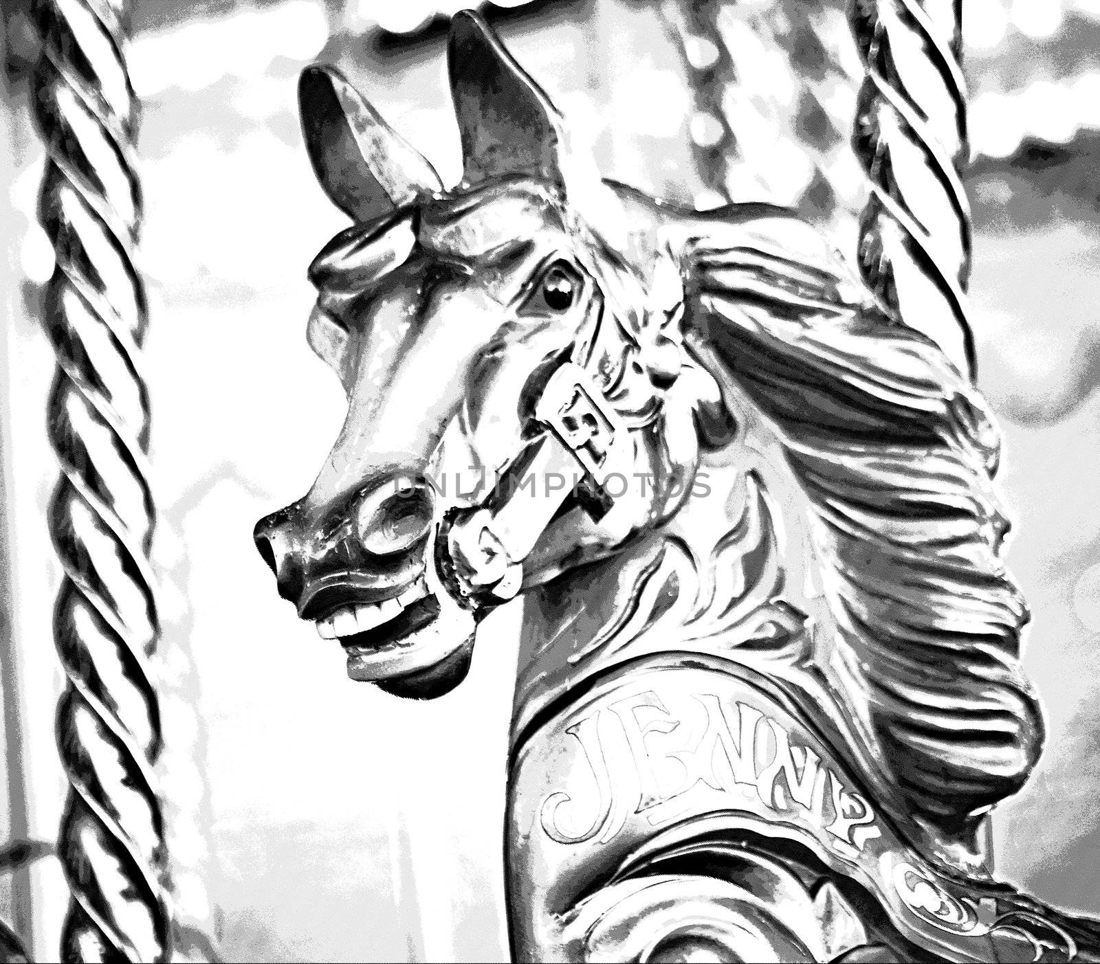 A wooden horse on a carousel ride