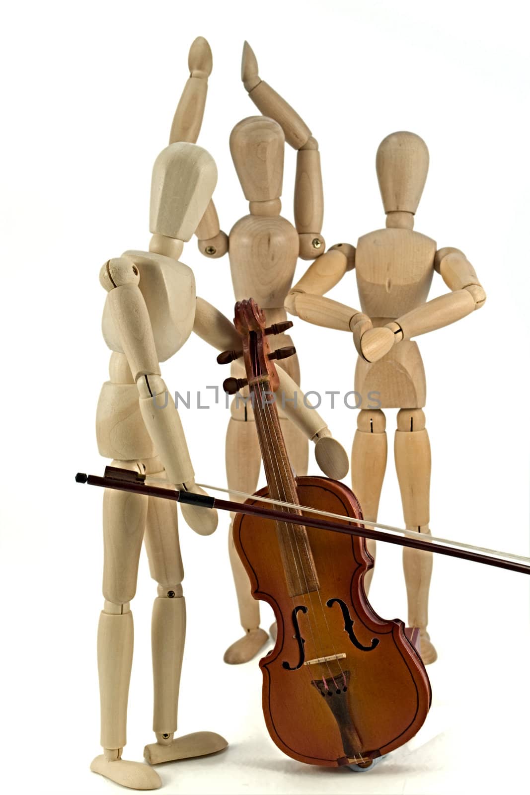 A wooden mannequin playing the violin.