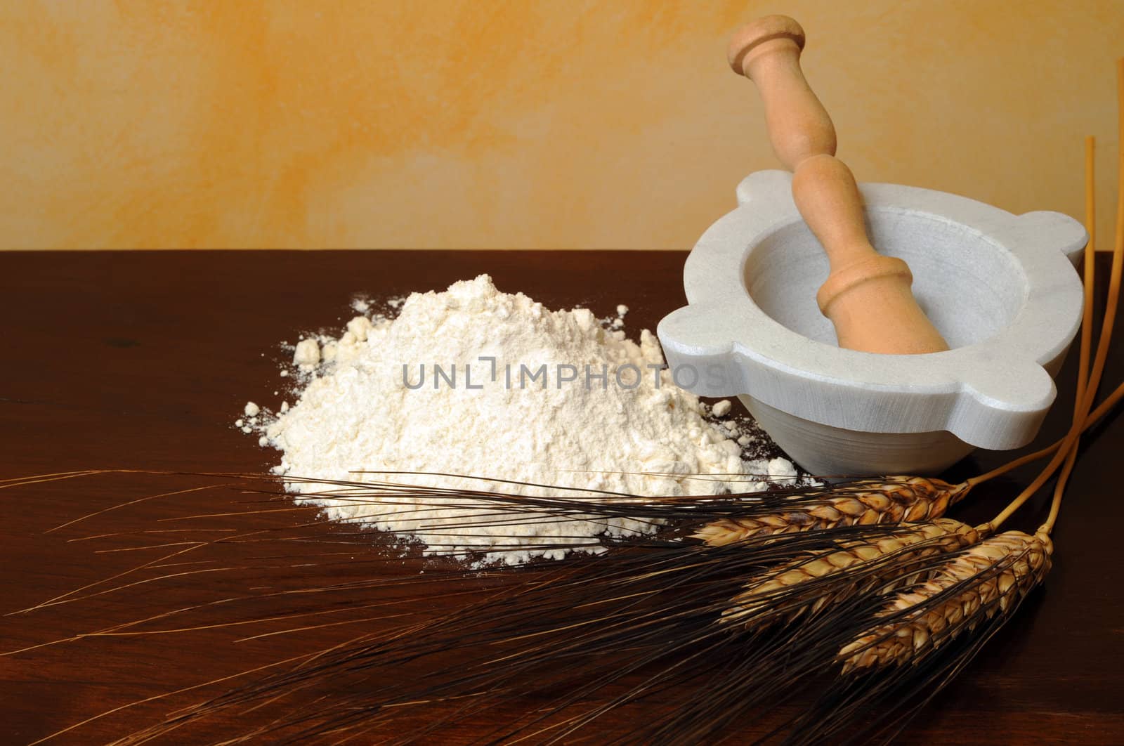 Flour, wheat ears wooden table