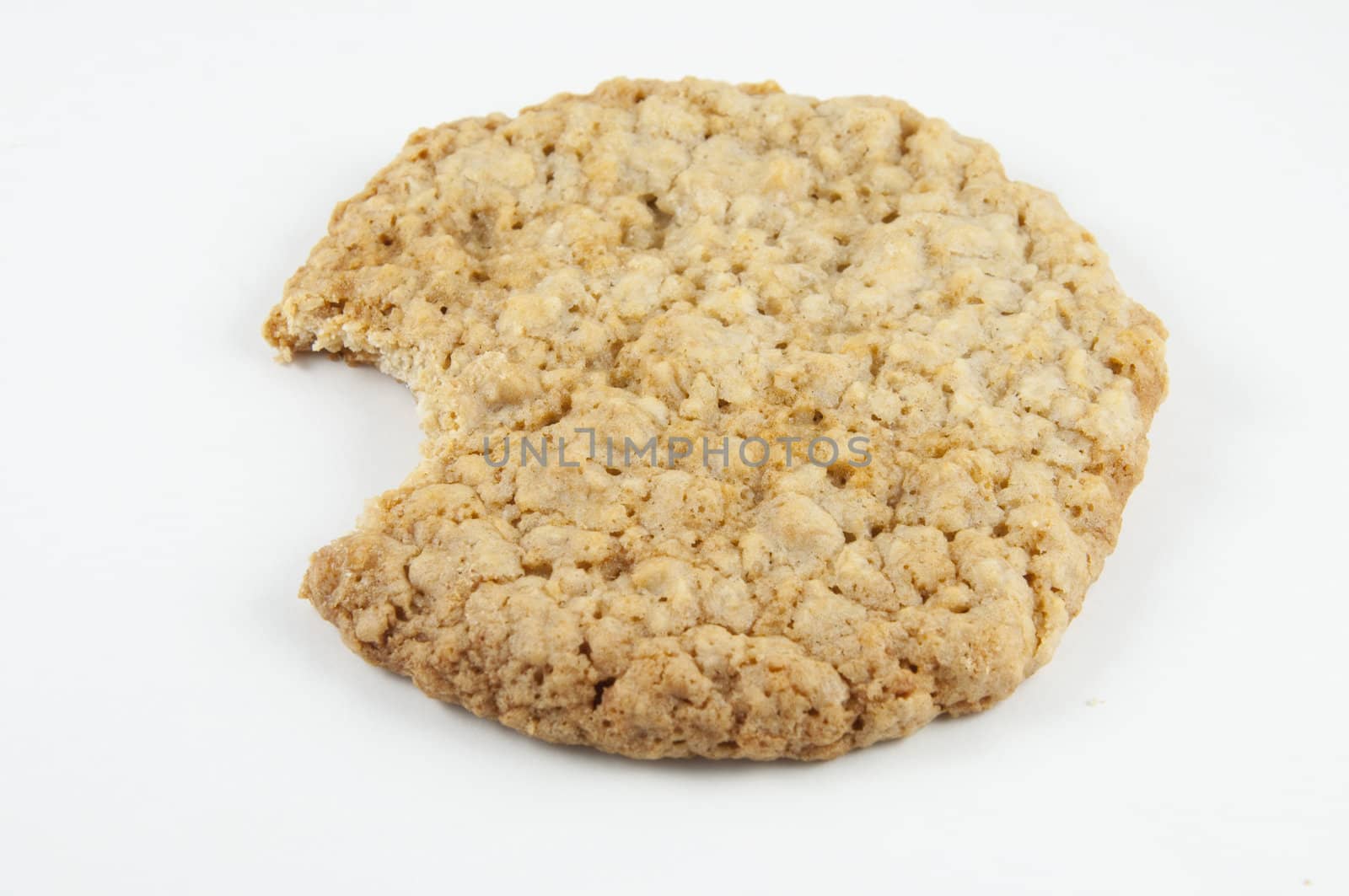 An oatmeal cookie isolated on white