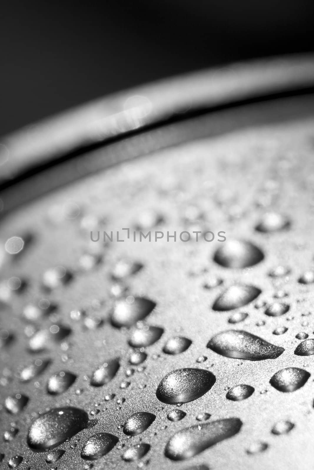 water drops on silver metal surface