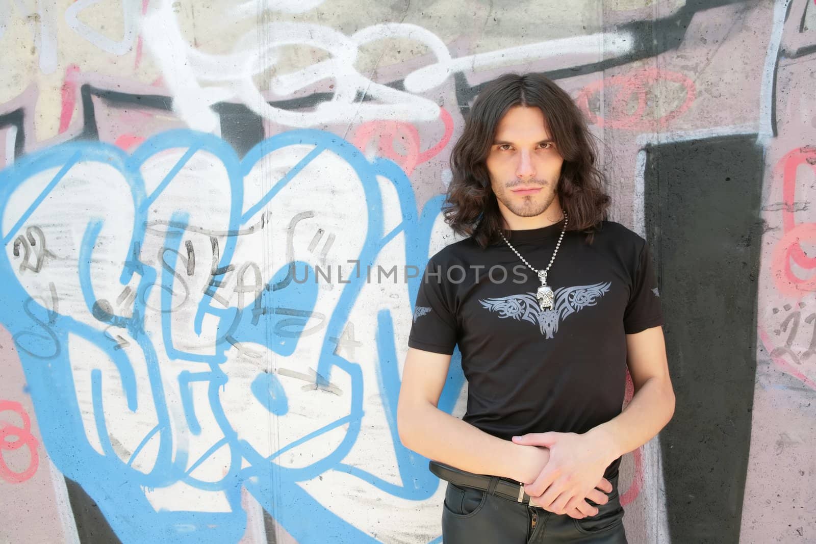 portrait long-haired young men in gothic style