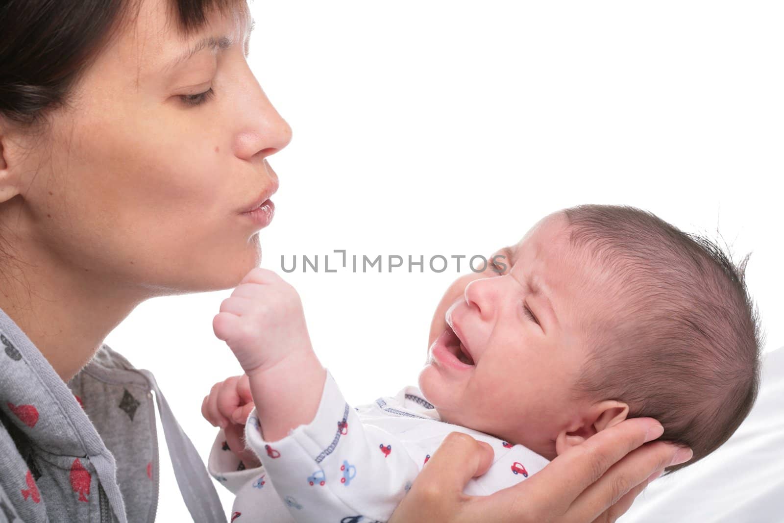 mamma and little crying boy on white background