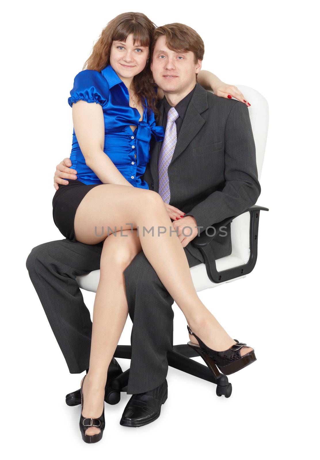 Young couple sitting in a comfortable office chair