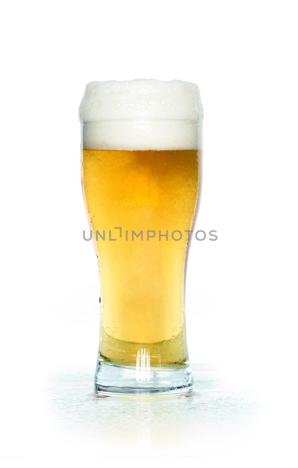 A glass of light beer isolated on white background with clipping path