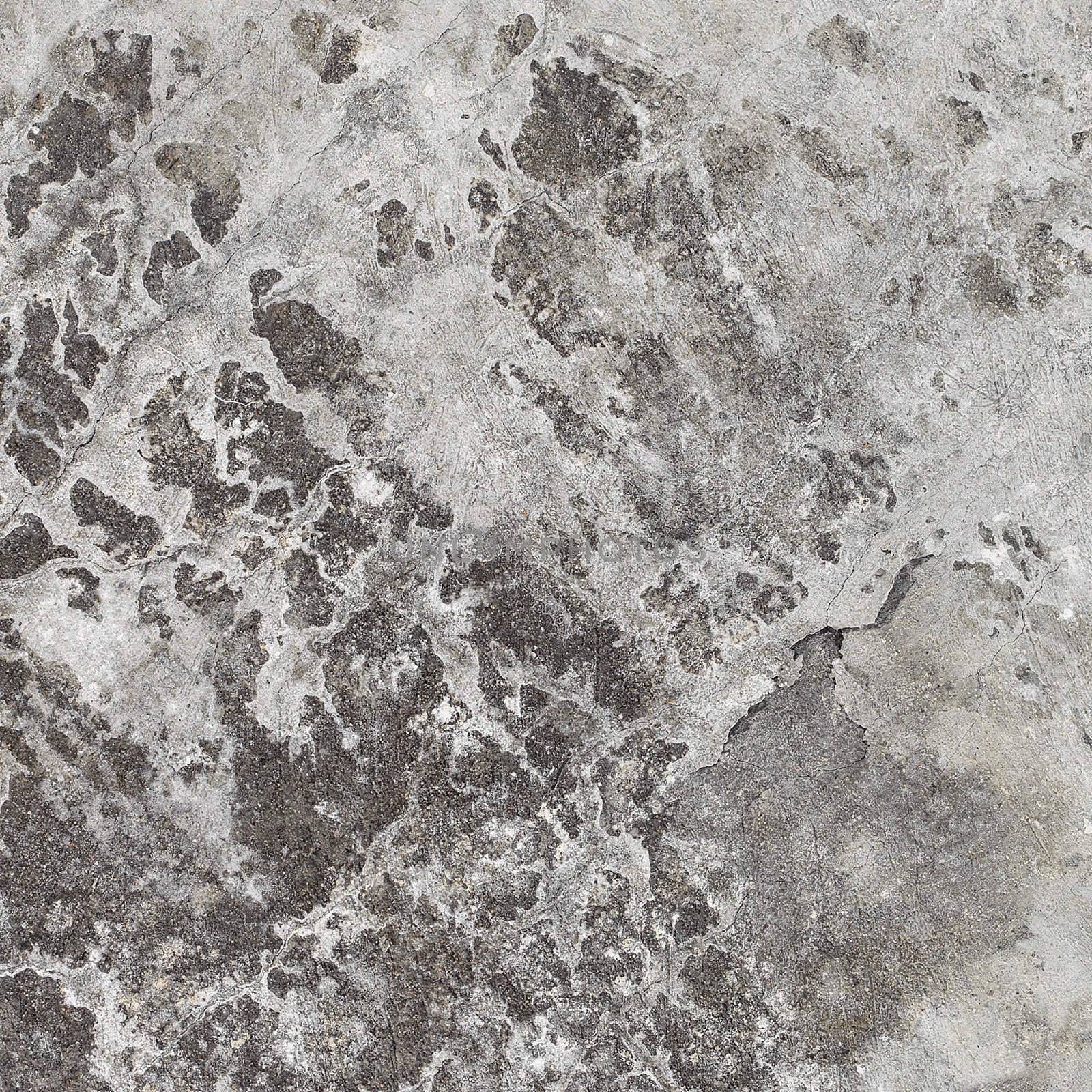 A square texture gray stone wall with spots