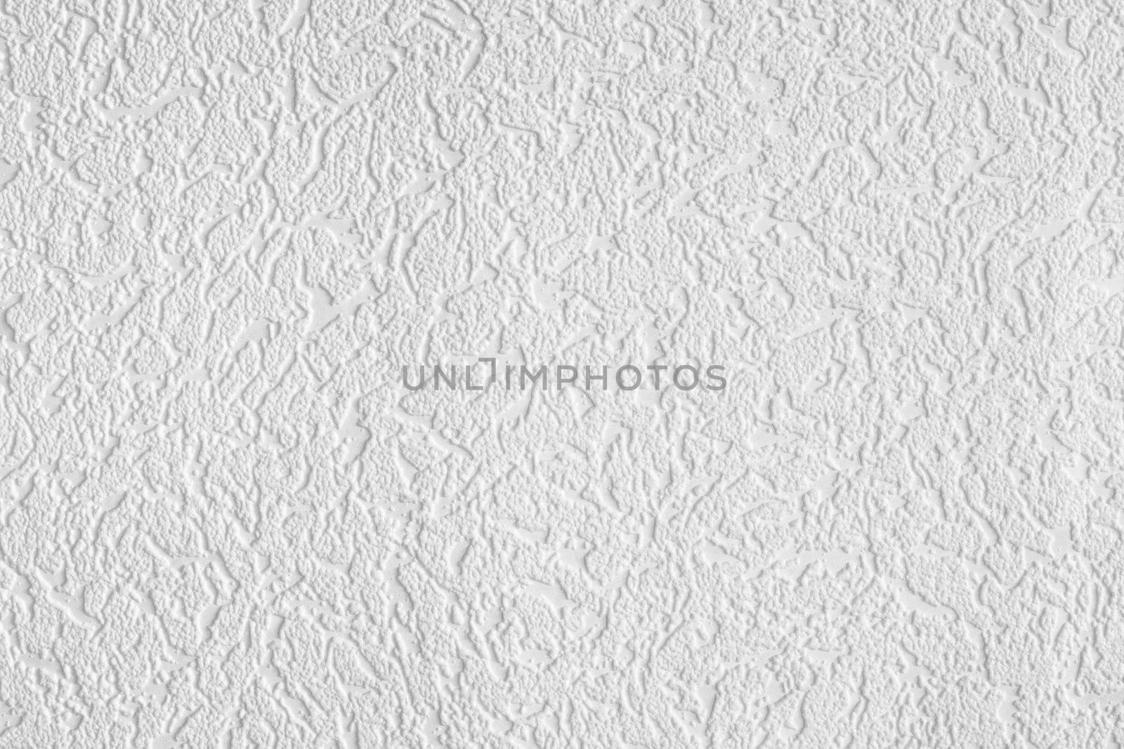 Surface of white wall-paper having the relief