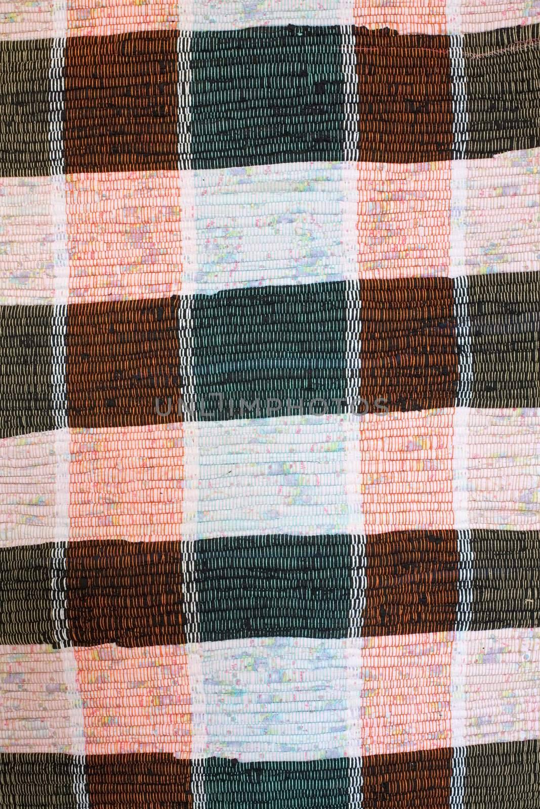 Surface of a colour ancient rural rug