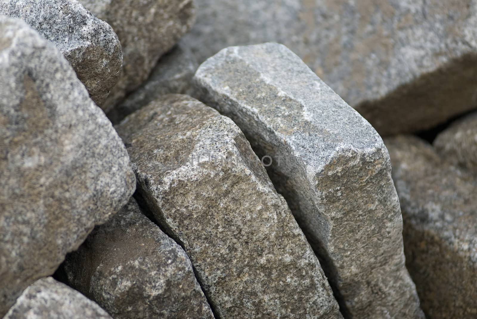 a bunch of cobblestones at a building site