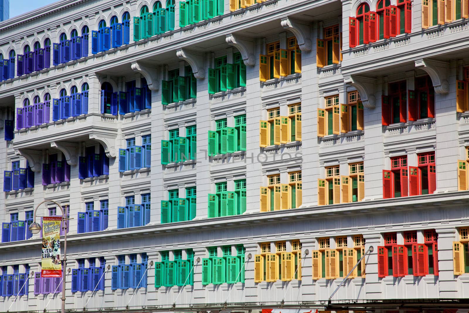 Colourful shutters gracing Mica Building in SIngapore.