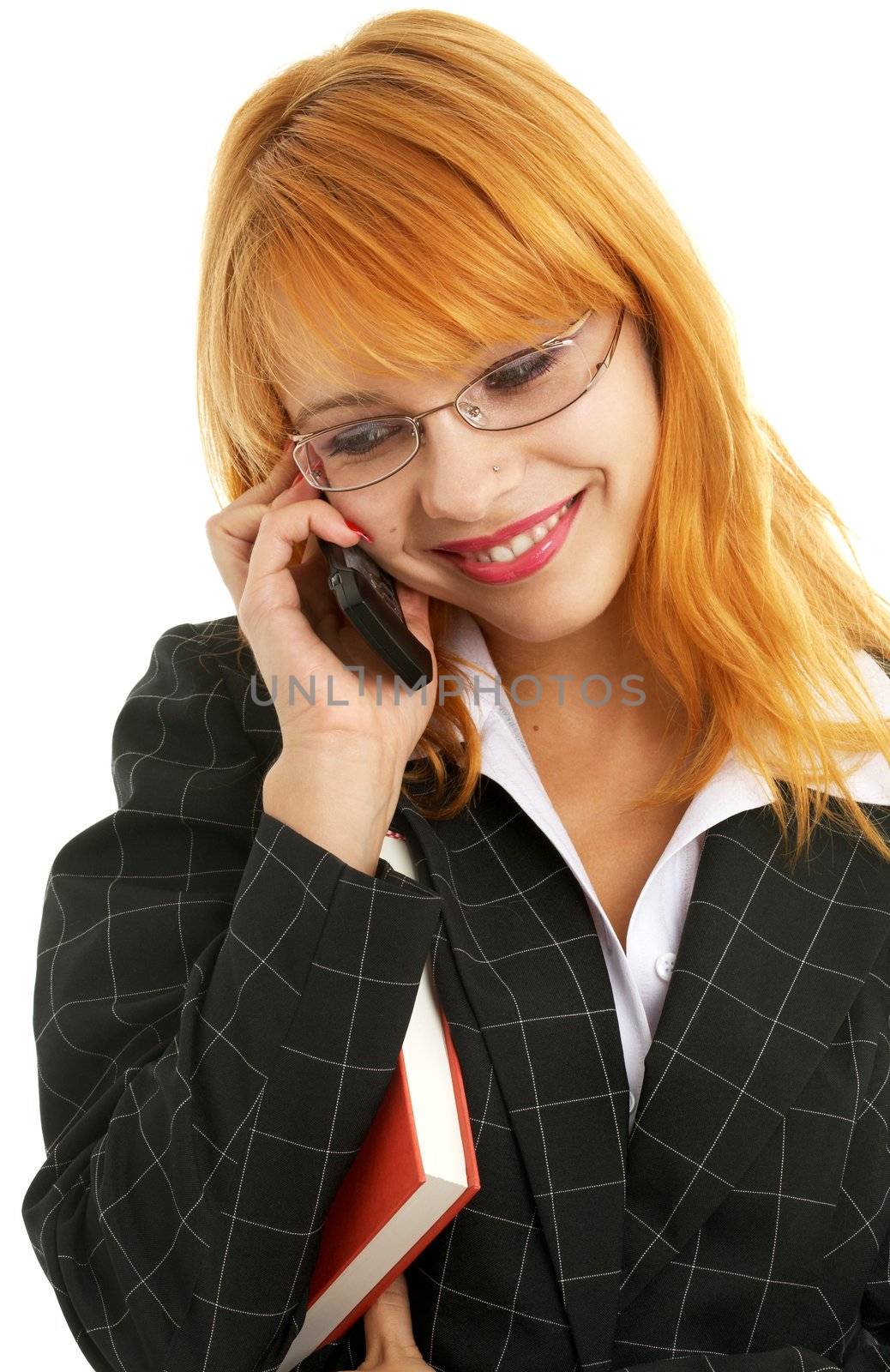 businesswoman with book making a phone call