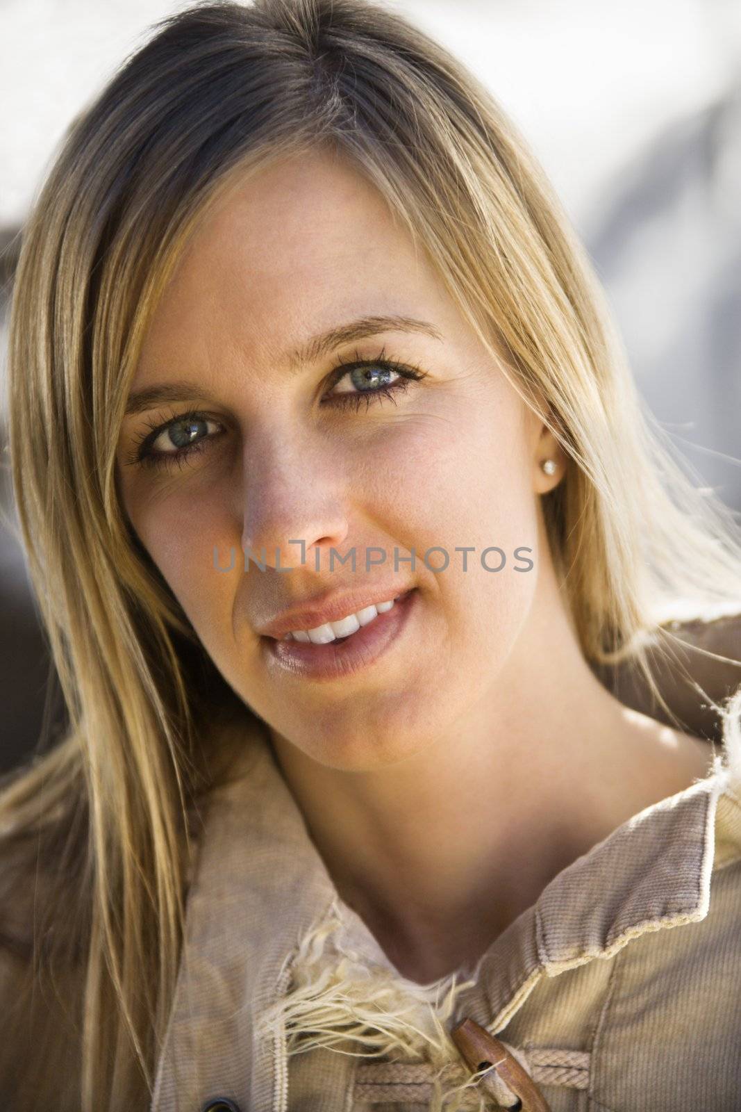 Attractive young adult Caucasian female looking at viewer.