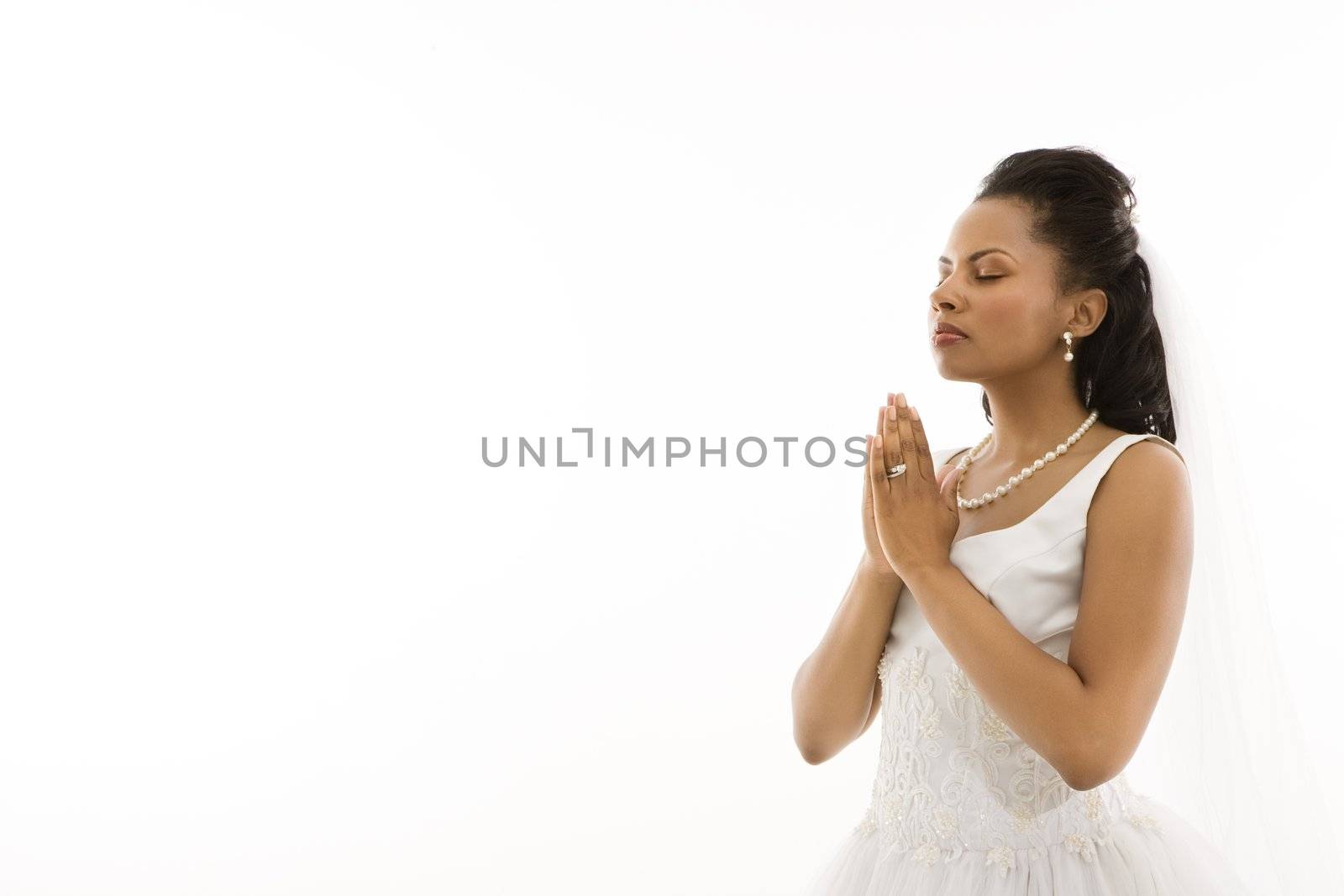 Praying bride. by iofoto