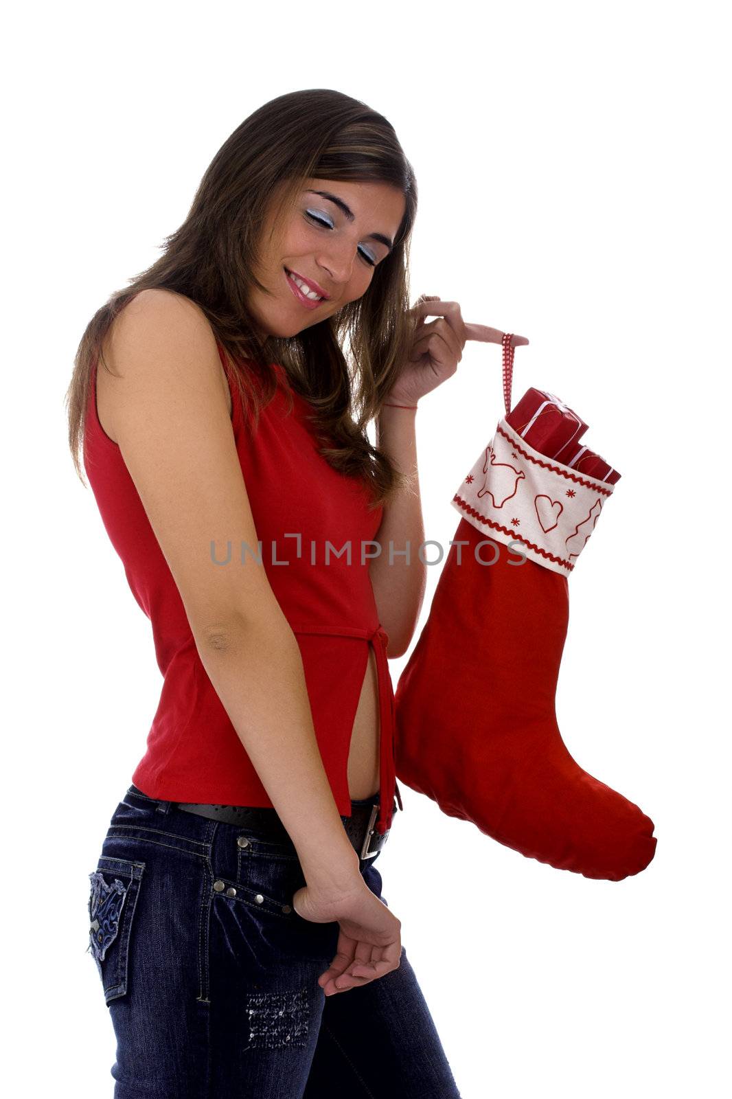 Christmas season! Different poses of a beautiful woman with a Christmas Socks full of small gifts inside.