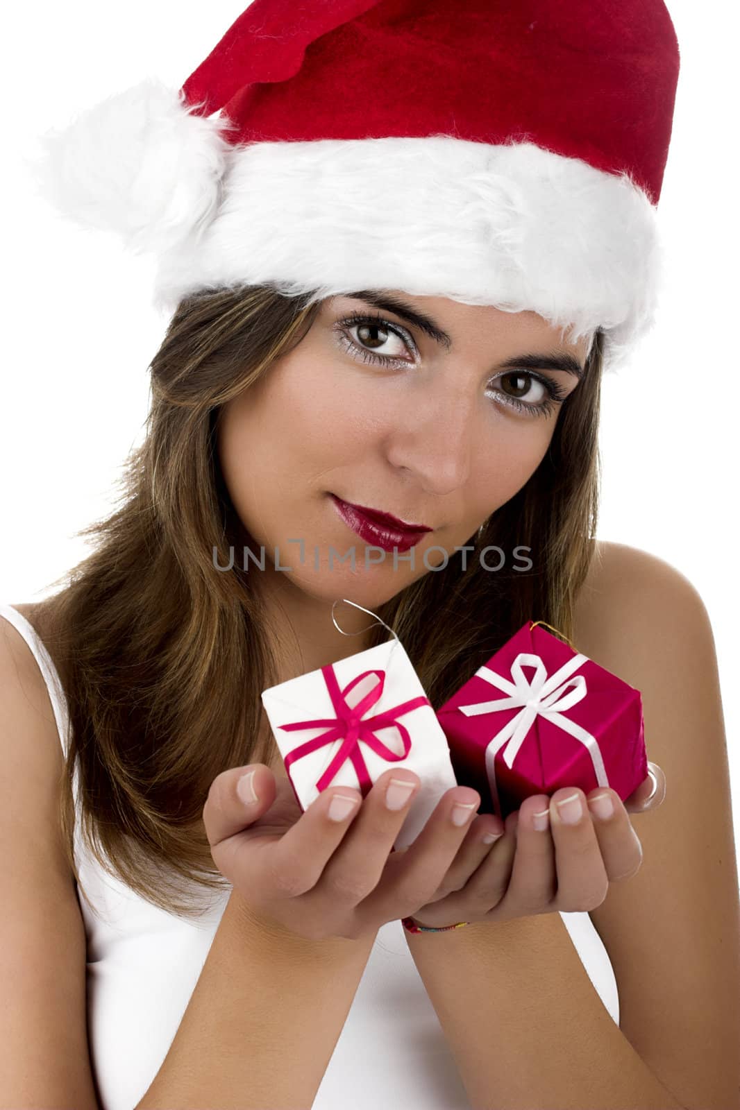 Christmas season! Different poses of a beautiful woman with small gifts on the hands.  (Focus is on the face)