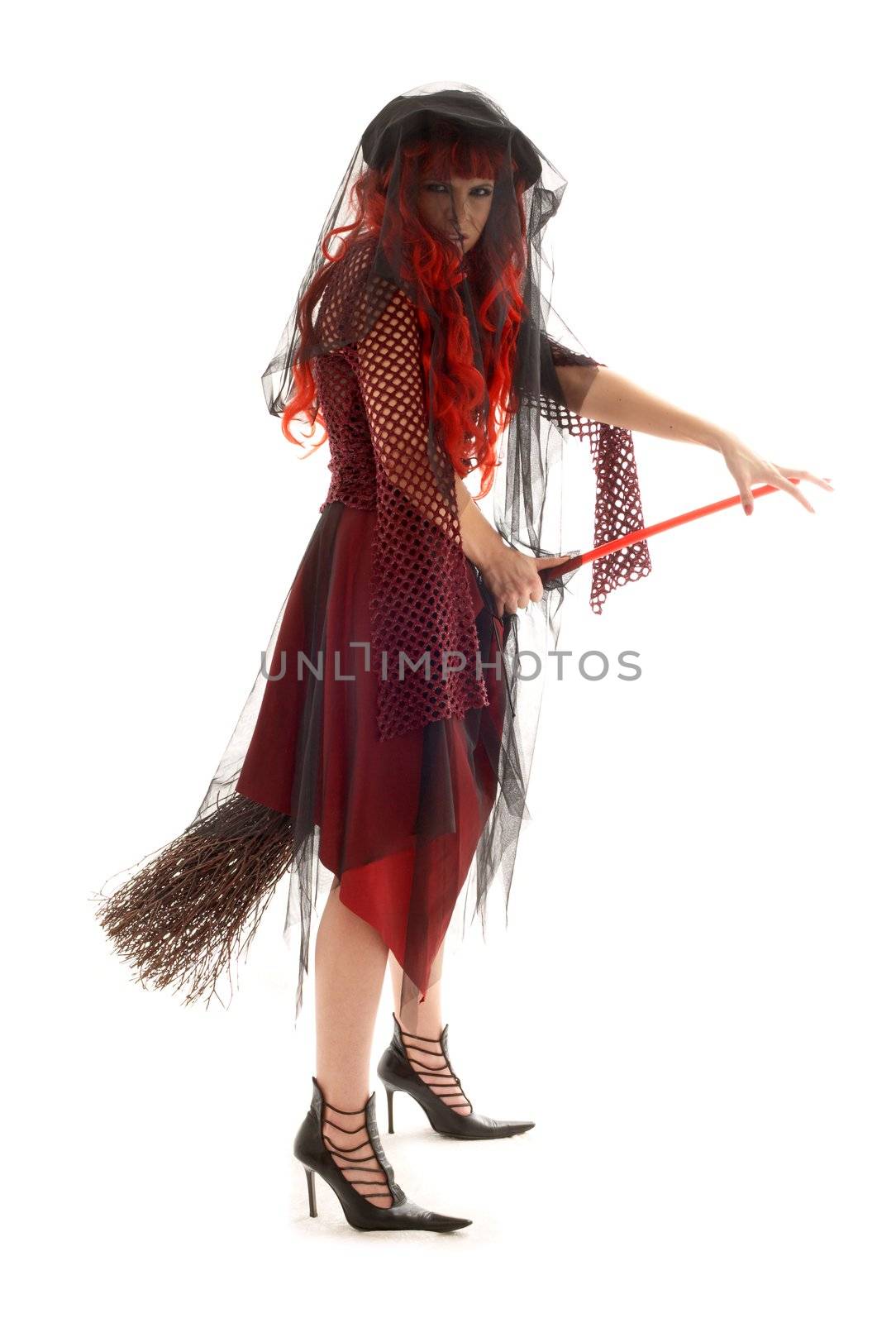 evil halloween witch with a broom