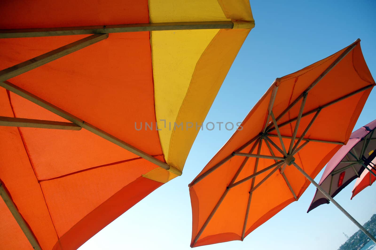 Colorful beach umbrellas by haak78