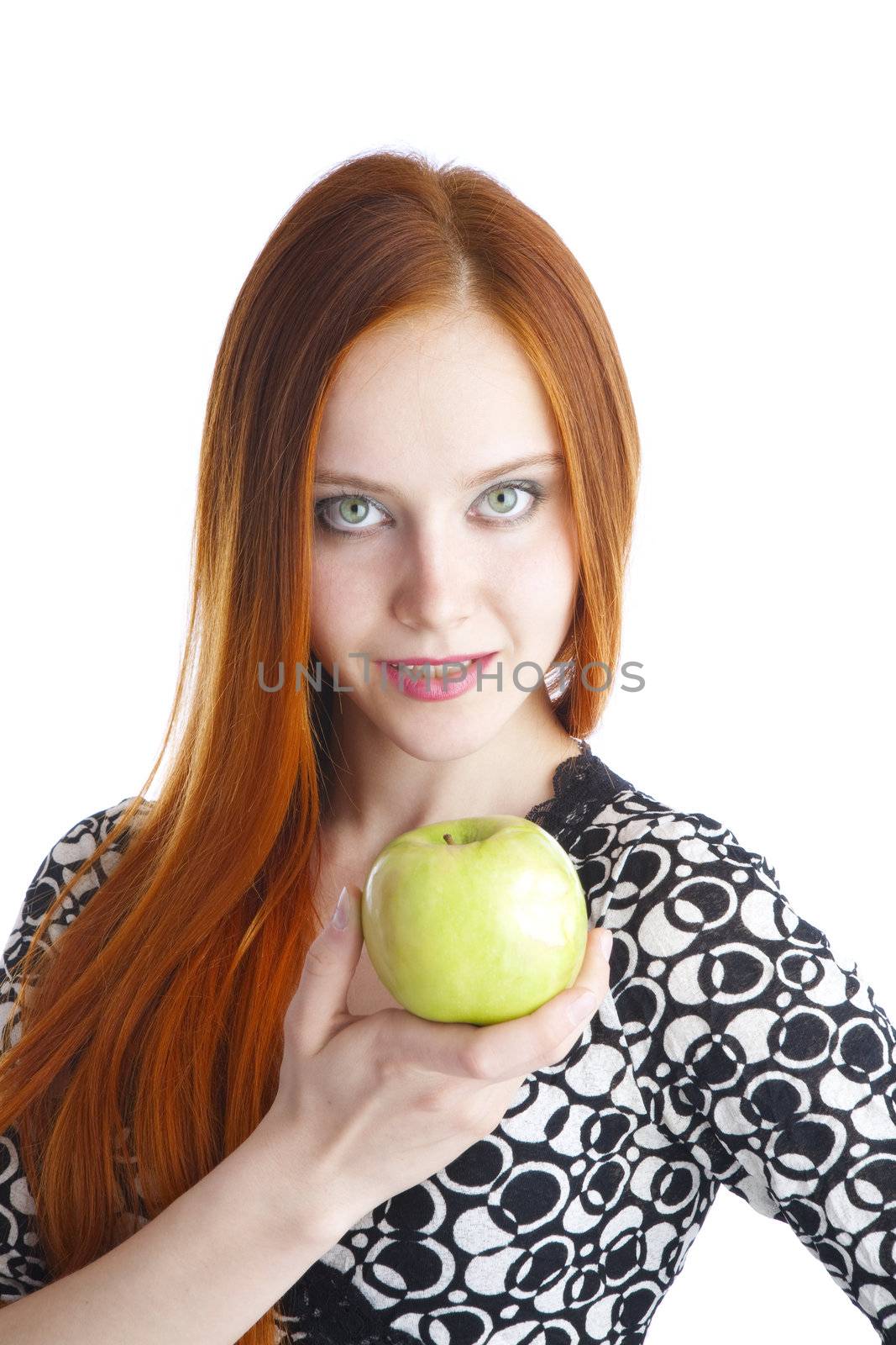 green tasty apple in hands of the girl
