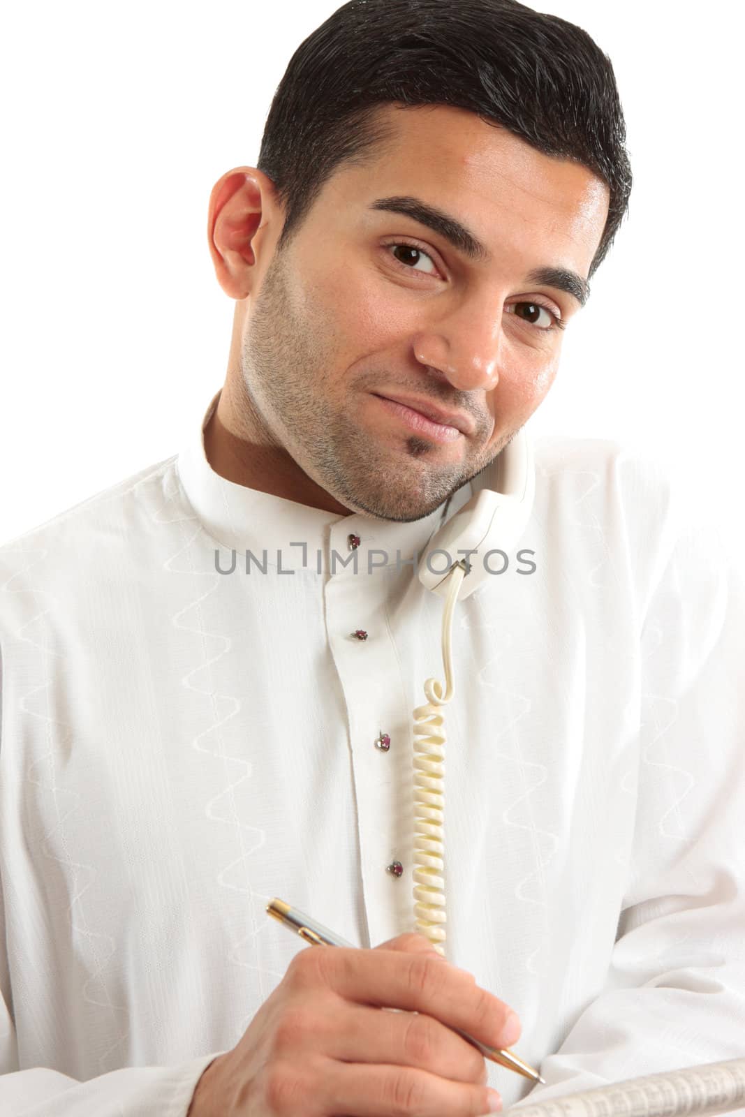 Ethnic mixed race businessman, financial analyst, stockbroker, banker etc on telephone call and holding newspaper