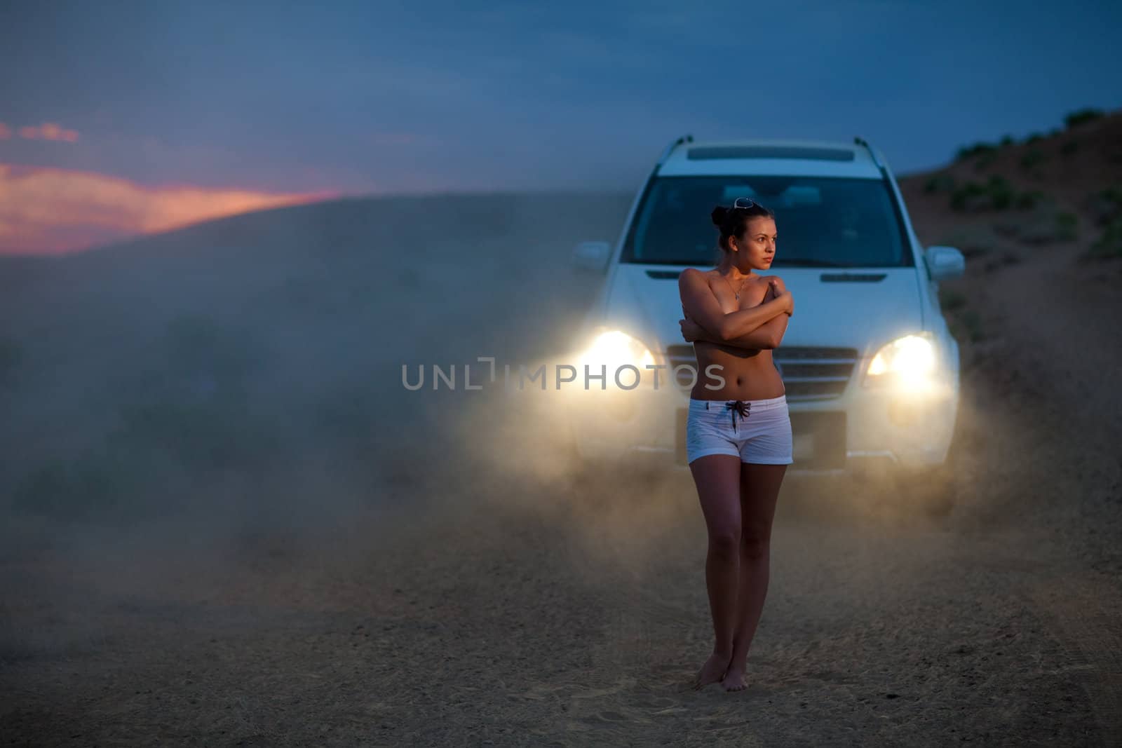 girl and car in the evening