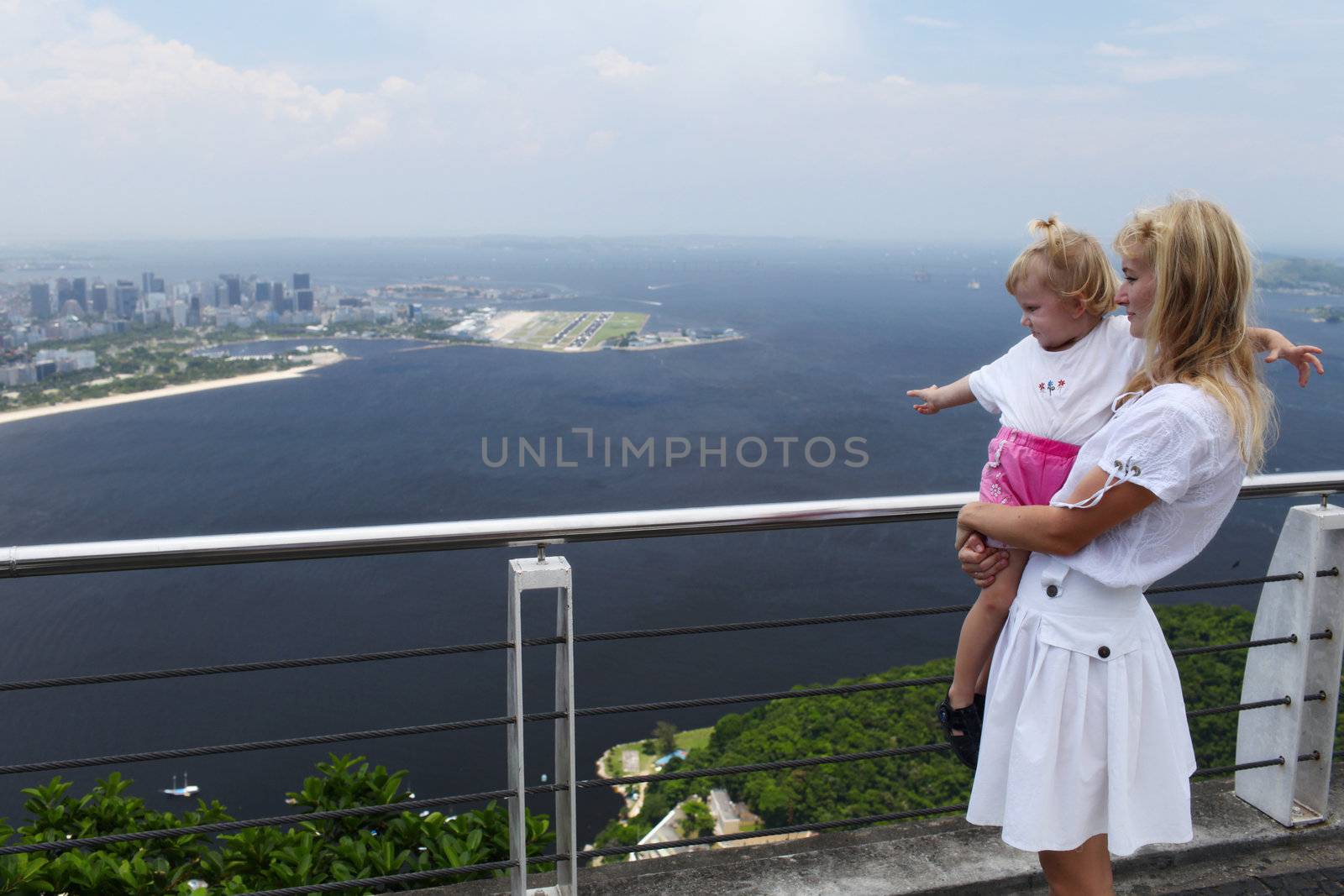 girl and mom at a high viewing platform by vsurkov