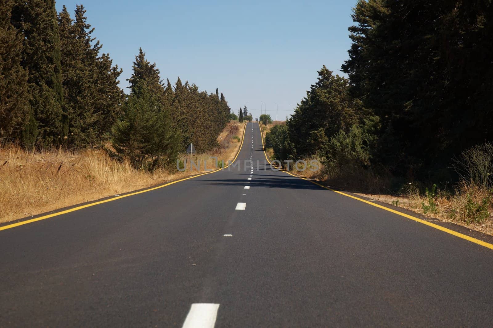 A view of an empty highway road .